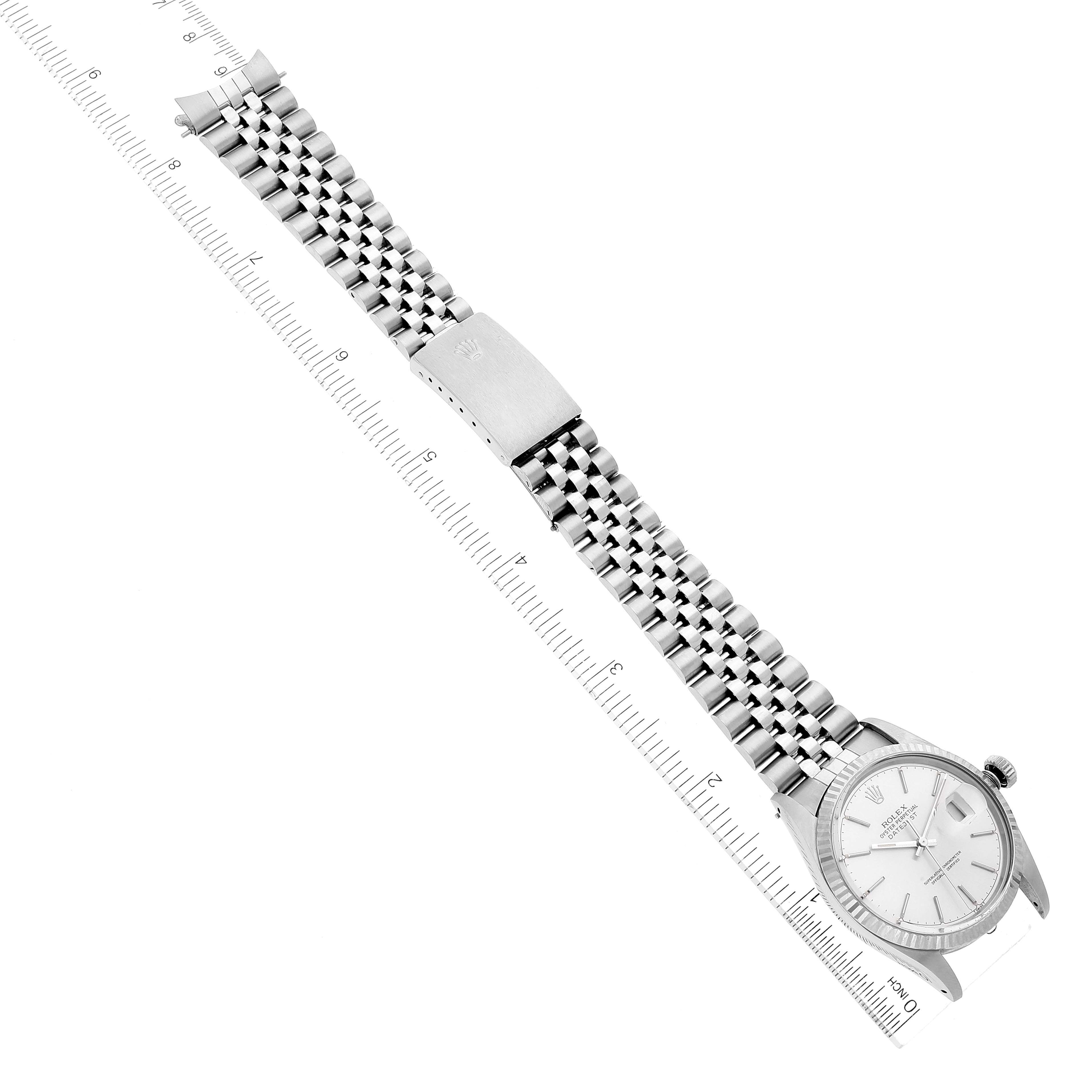 The image shows the Vintage Collection model Rolex watch laid out flat with the full bracelet and clasp visible, alongside a ruler for scale.