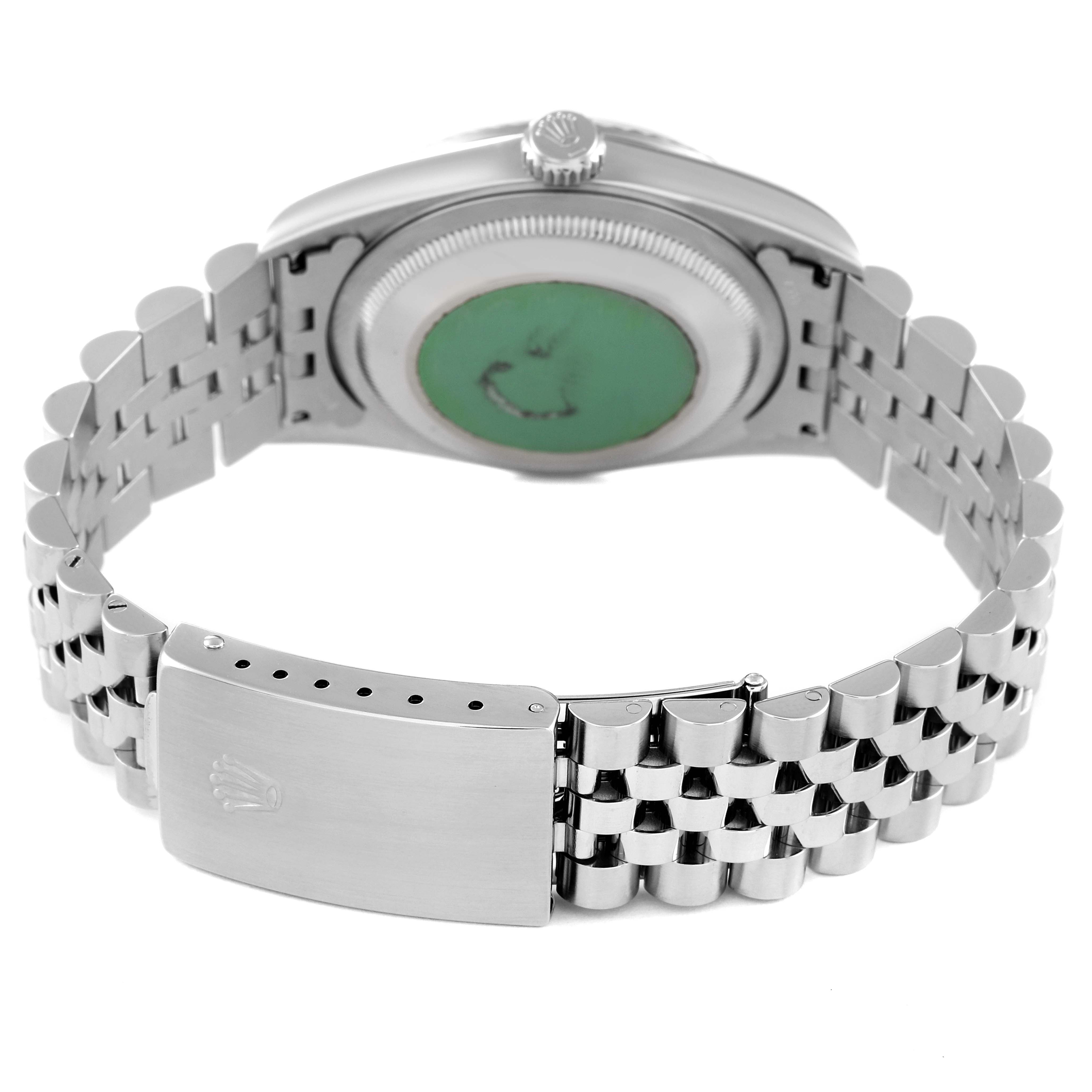 The image shows the back view of a Rolex Datejust 16234 Men's Stainless Steel Silver Dial 16234 Men's Stainless Steel Silver Dial watch, focusing on the case back and metal bracelet with the clasp.