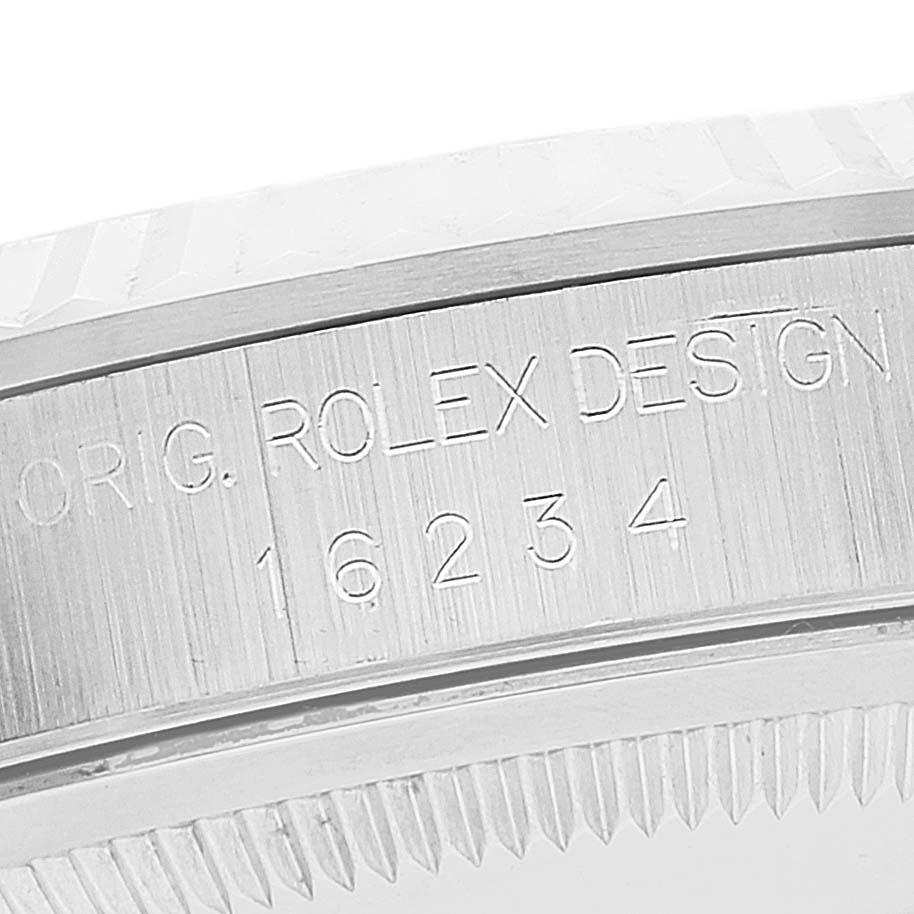 A close-up view of the watch case side for the Rolex Datejust 16234 Men's Stainless Steel Silver Dial 16234 Men's Stainless Steel Silver Dial model, showing the "16234" engraving.
