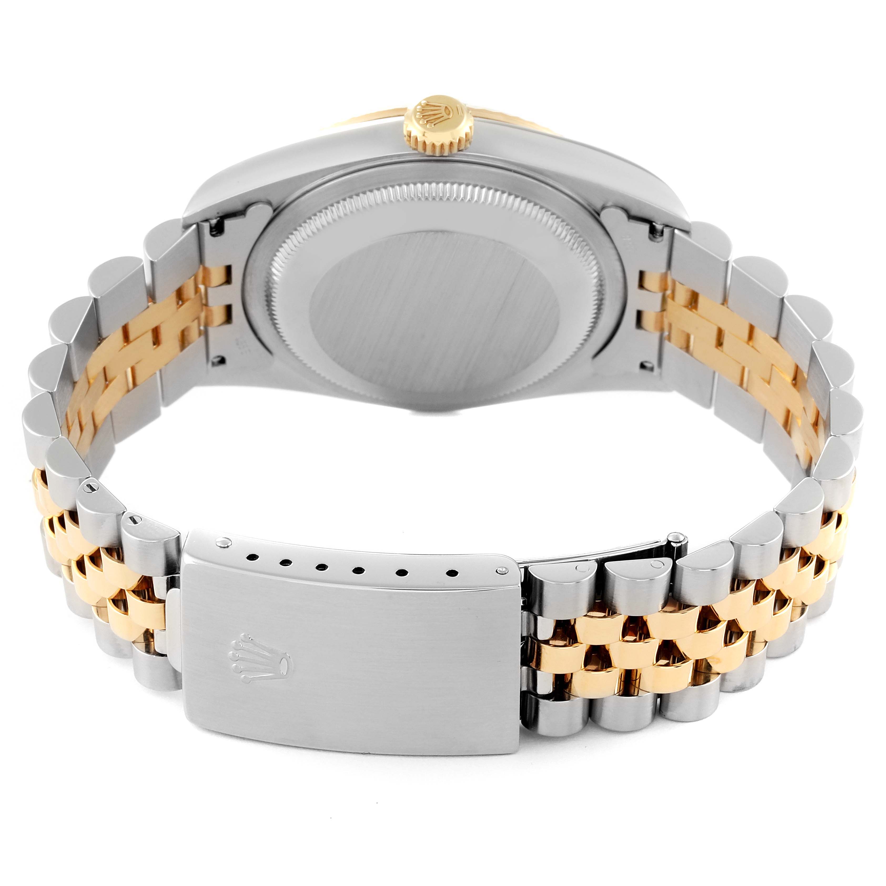 The image shows the back view of the Rolex Datejust 16233 Men's Steel and Gold (two tone) Black Dial 16233 Men's Steel and Gold (two tone) Black Dial watch, featuring its clasp, case back, and two-tone bracelet.