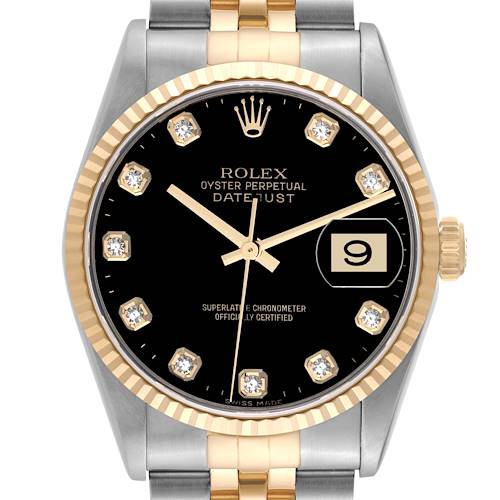 This image shows a full frontal view of a Rolex Datejust watch, highlighting its black dial, diamond hour markers, gold fluted bezel, and two-tone bracelet.