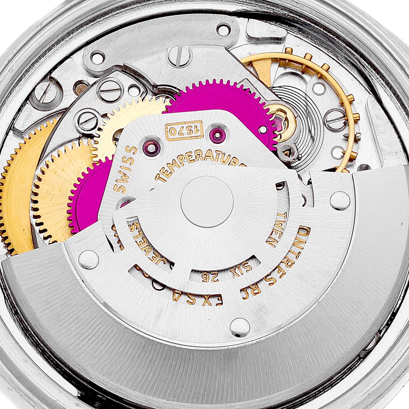 This image shows the intricate inner mechanism and movement of the Rolex Datejust 1601 Men's Steel and Gold (two tone) Champagne Dial 1601 Men's Steel and Gold (two tone) Champagne Dial watch from a close-up angle.