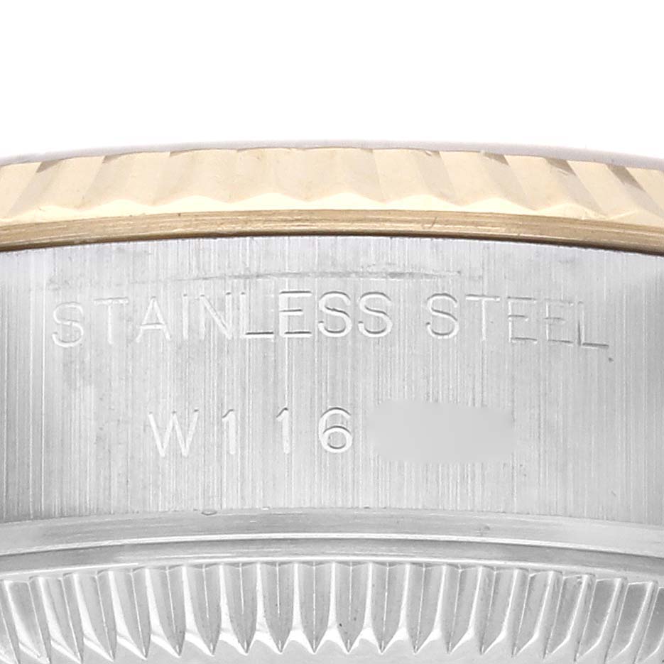 This image shows a close-up angle of the Datejust model by Rolex, highlighting its stainless steel case with visible engravings.