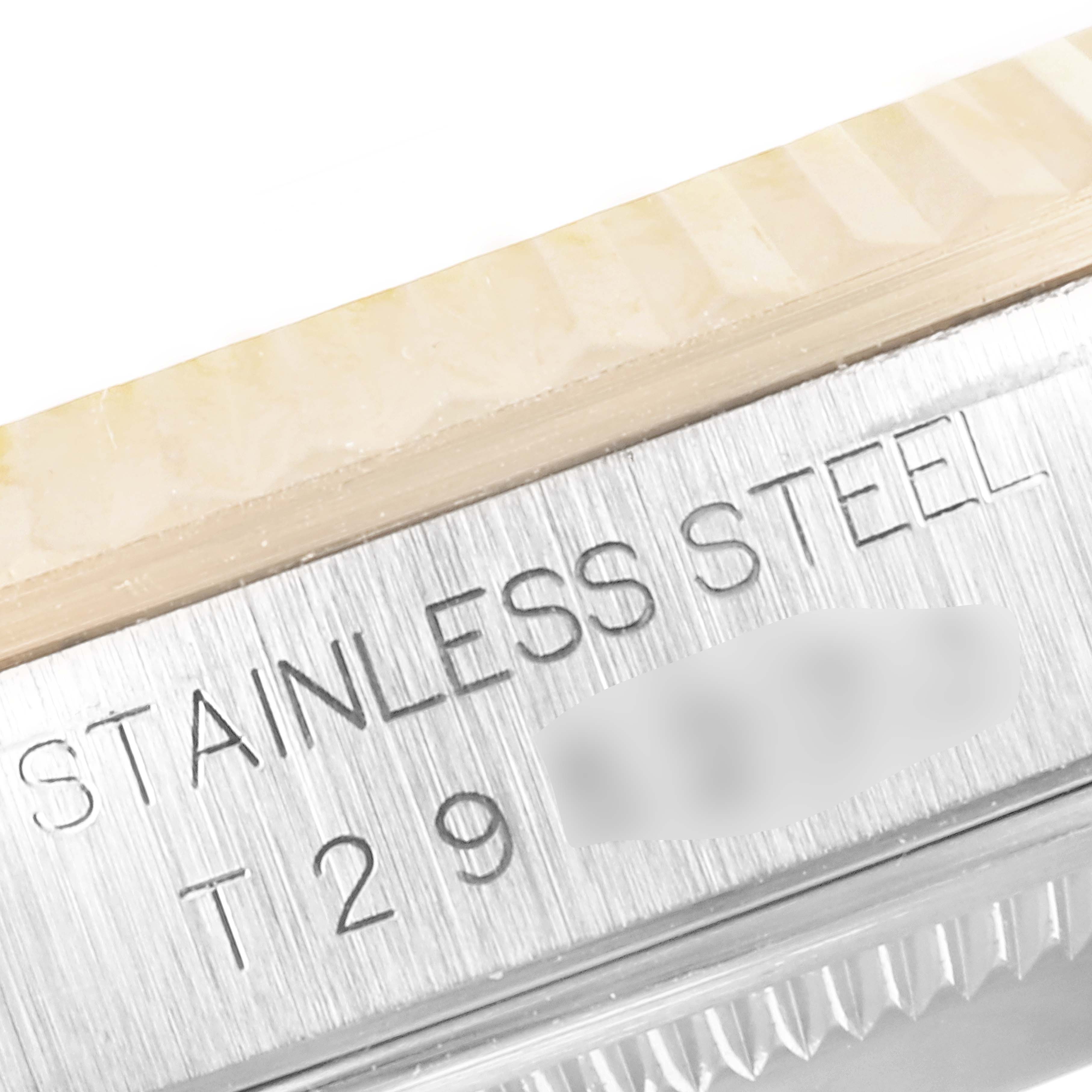 This close-up angle shows the engraved "Stainless Steel" text on the casing of a Rolex Datejust 16233 Men
s Steel and Gold (two tone) Grey Dial 16233 Men
s Steel and Gold (two tone) Grey Dial watch.