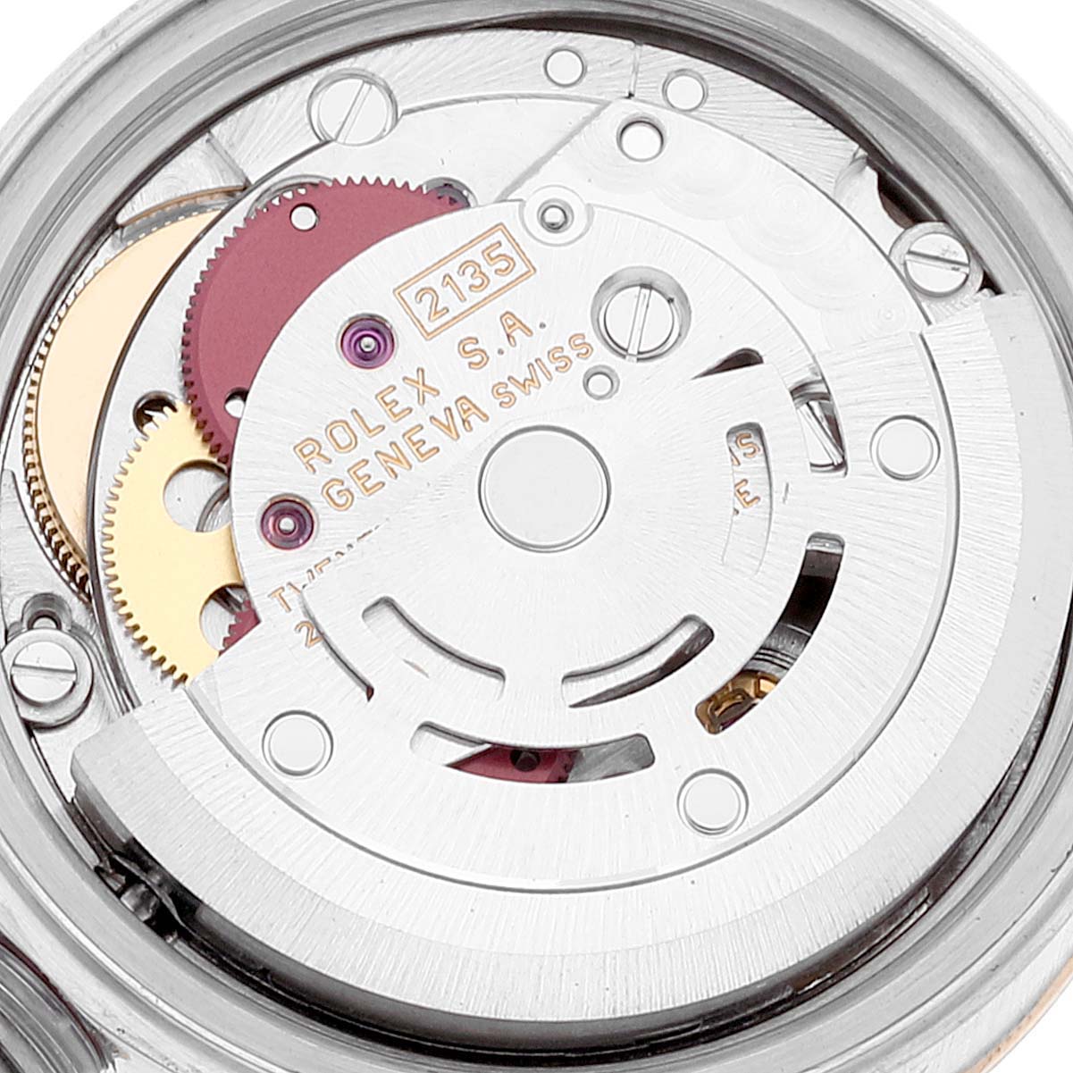 The image shows the internal mechanism of a Rolex Datejust 69173 Women
s Steel and Gold (two tone) White Dial 69173 Women
s Steel and Gold (two tone) White Dial watch, featuring gears and the movement components.