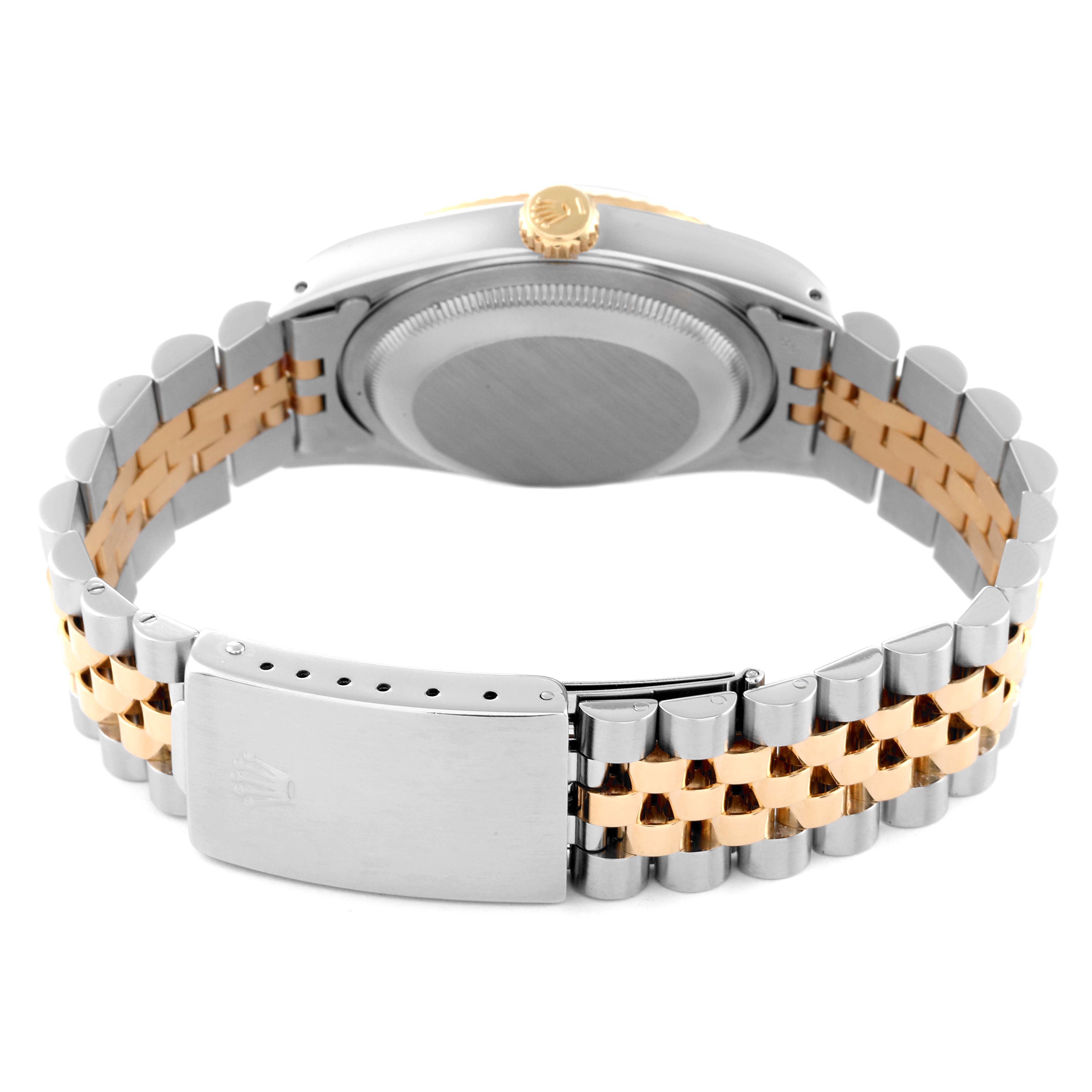 The image shows the back of a Rolex Datejust 16233 Men's Steel and Gold (two tone) White Dial 16233 Men's Steel and Gold (two tone) White Dial watch, highlighting the two-tone bracelet, clasp, and case back.