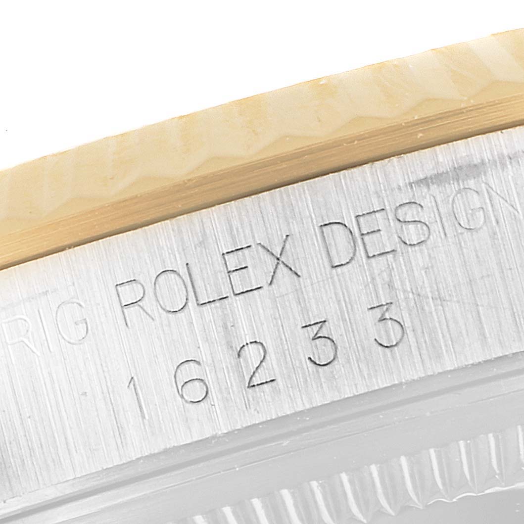 This image shows a close-up of the engraved model number "16233" on the case of a Rolex Datejust 16233 Men's Steel and Gold (two tone) White Dial 16233 Men's Steel and Gold (two tone) White Dial watch.