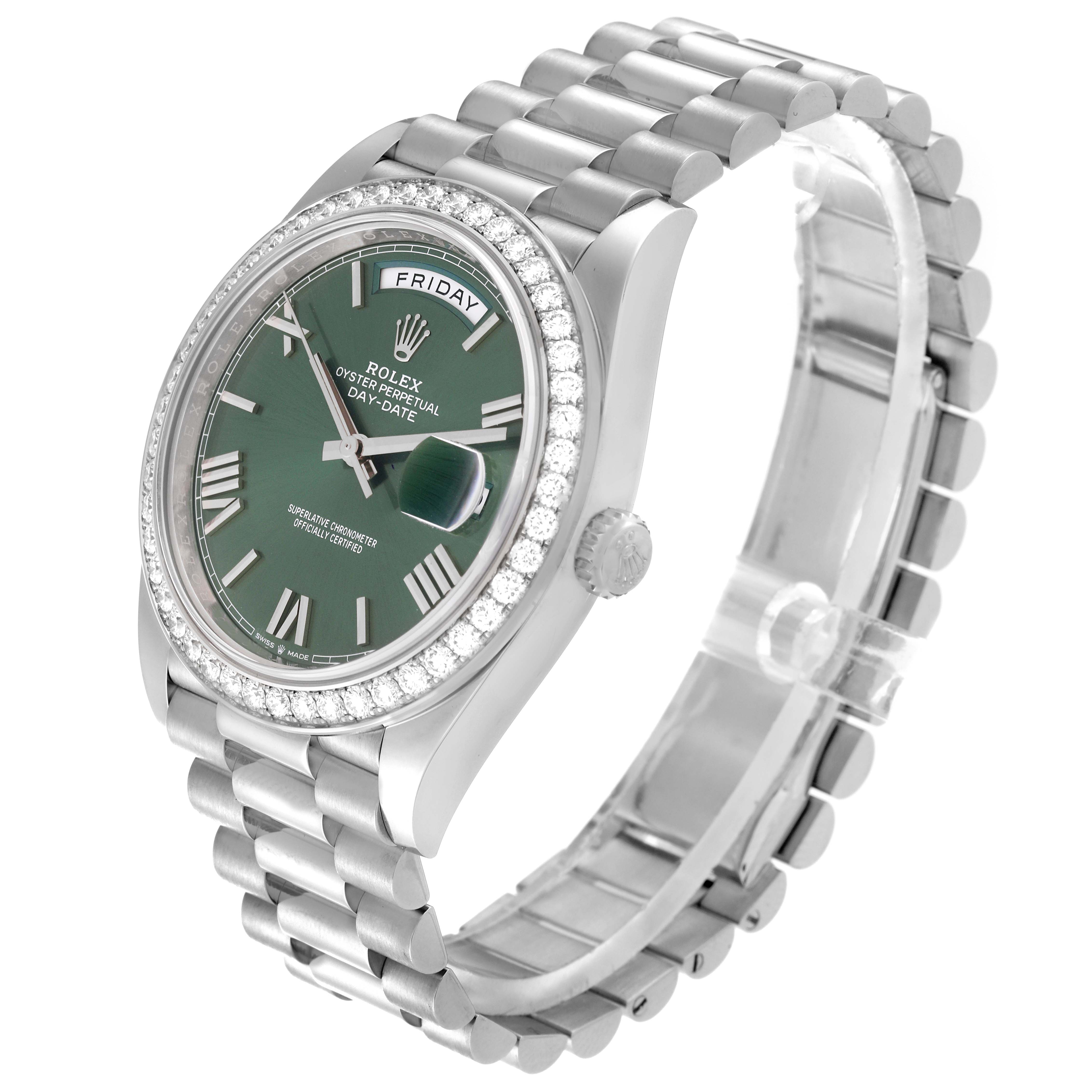 The image shows a Rolex President 228349RBR Men's White Gold Green Dial 228349RBR Men's White Gold Green Dial watch, showcasing its green dial, day-date display, diamond bezel, and bracelet from an angled perspective.