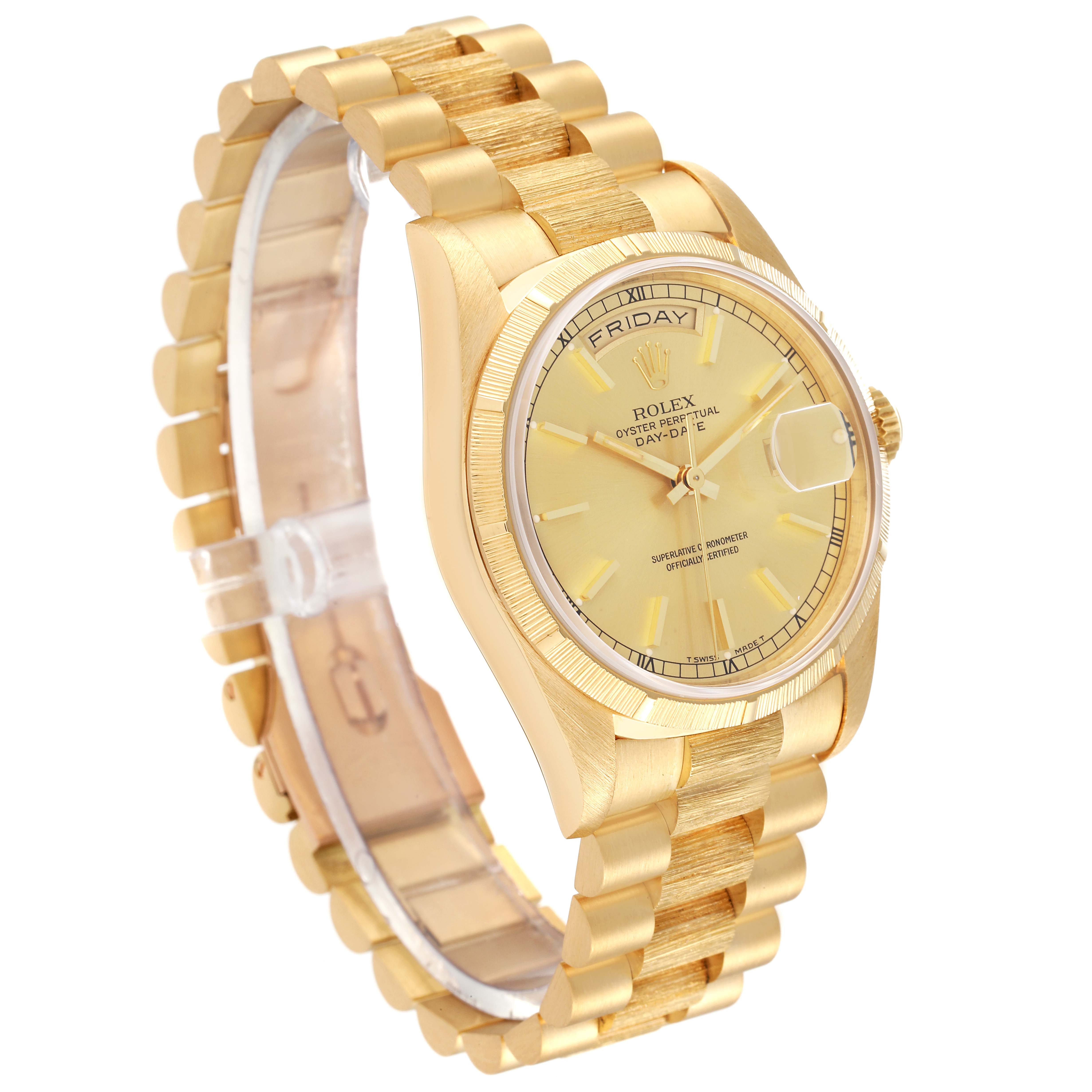 This image shows the gold-tone bracelet and dial of a Rolex President 18248 Men
s Yellow Gold Champagne Dial 18248 Men
s Yellow Gold Champagne Dial model watch, angled to display the day and date features.