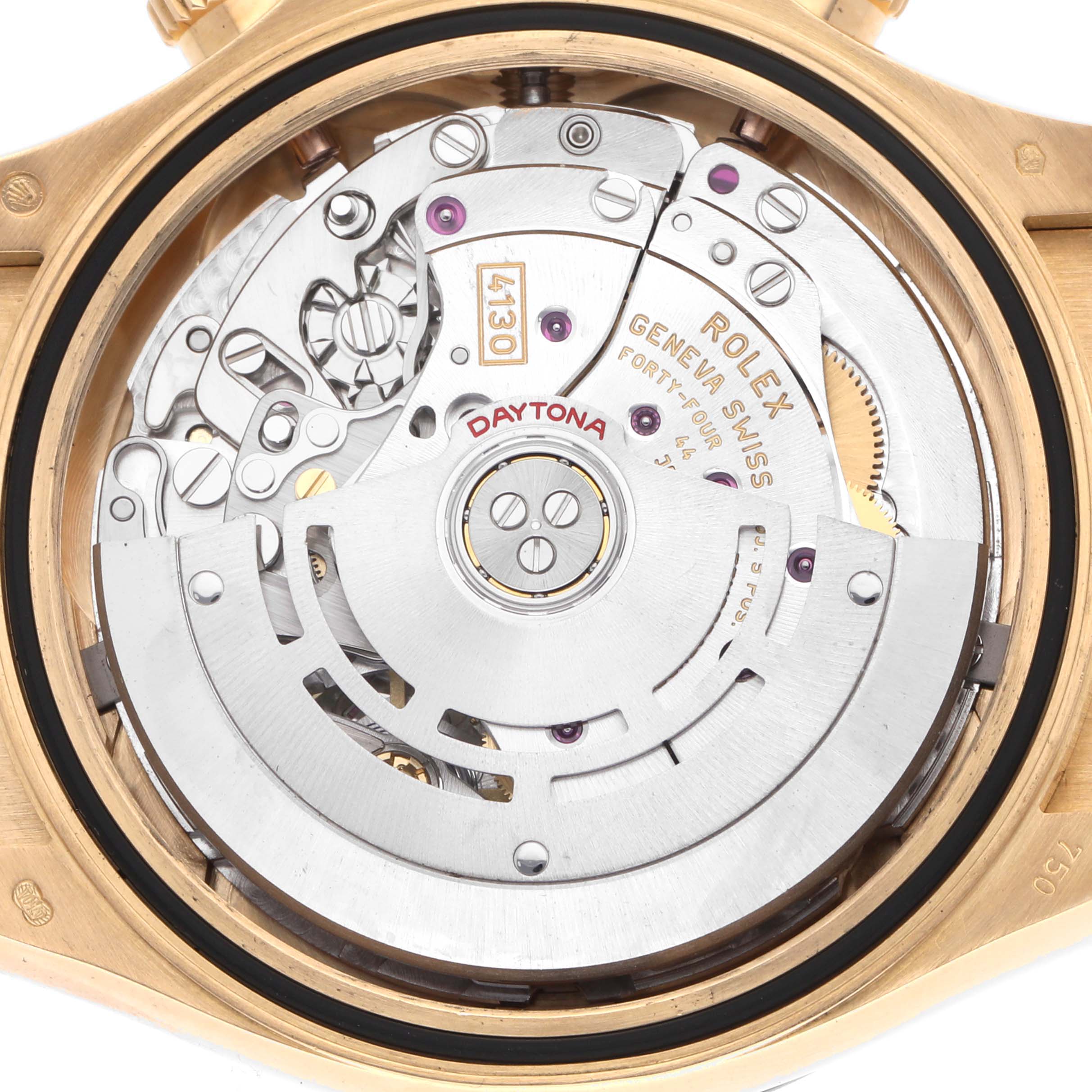 The image shows a close-up of the movement inside a Rolex Daytona 73019 Men
s Yellow Gold Champagne Dial watch, highlighting its intricate mechanical parts.