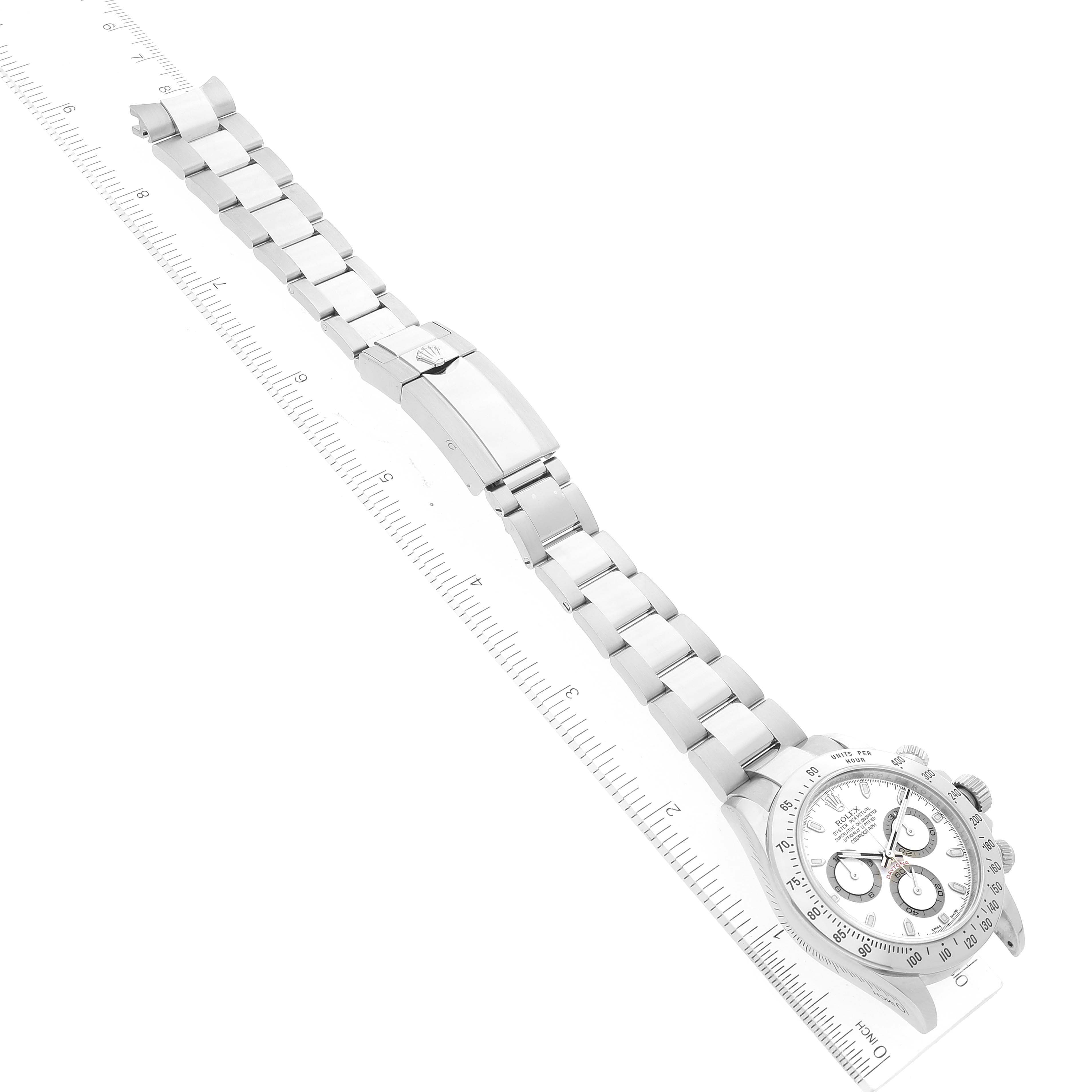 The image shows a side angle of a Rolex Daytona 116520 Men's Stainless Steel White Dial 116520 Men's Stainless Steel White Dial watch, highlighting its bracelet, clasp, and a partial view of the dial.