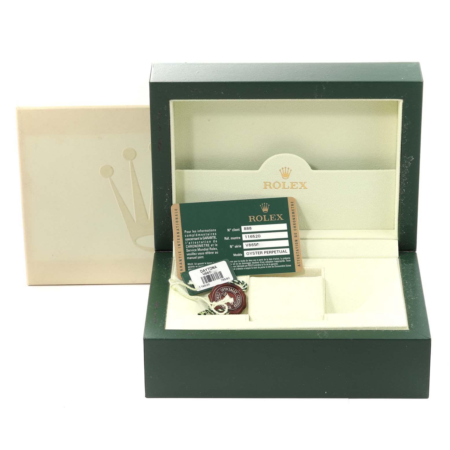 The image shows the open box and accessories of a Rolex Daytona 116520 Men's Stainless Steel White Dial 116520 Men's Stainless Steel White Dial watch, including a card and tag.