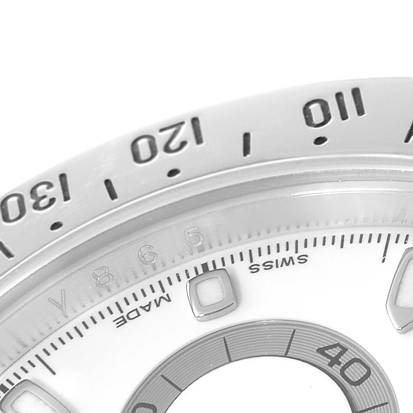 The image shows a close-up of the bezel, dial, and markers of a Rolex Daytona 116520 Men's Stainless Steel White Dial 116520 Men's Stainless Steel White Dial watch.