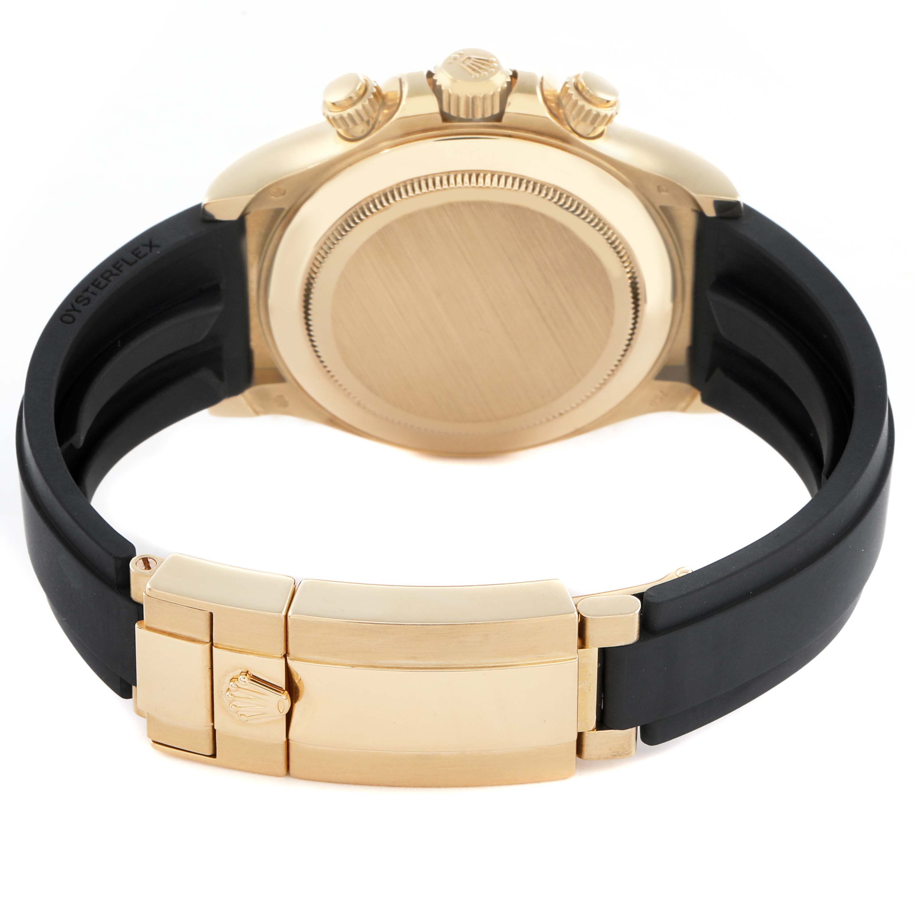 The image shows the back of a Rolex Daytona 116518LN Men
s Yellow Gold Champagne Dial watch, highlighting the gold case, crown, pushers, and clasp with an Oysterflex strap.