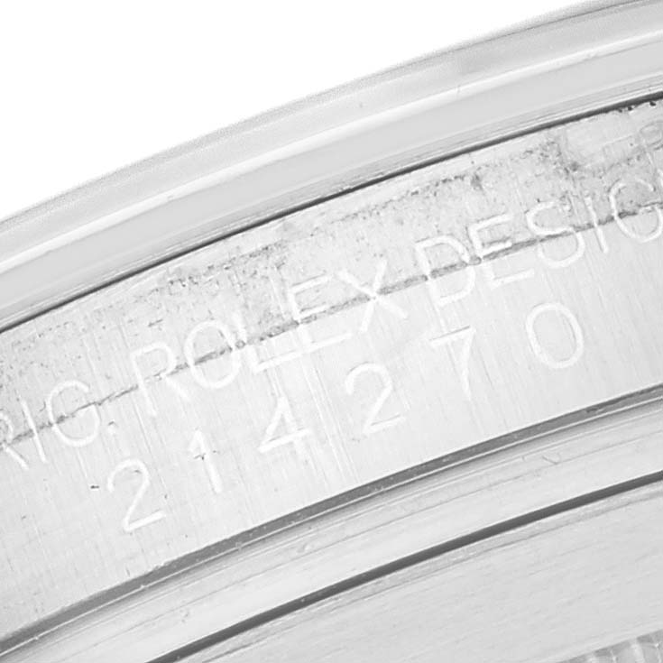 This close-up image shows the engraved serial number and "Rolex Design" on the inner bezel of a Rolex Explorer 214270 Men's Stainless Steel Black Dial 214270 Men's Stainless Steel Black Dial watch.