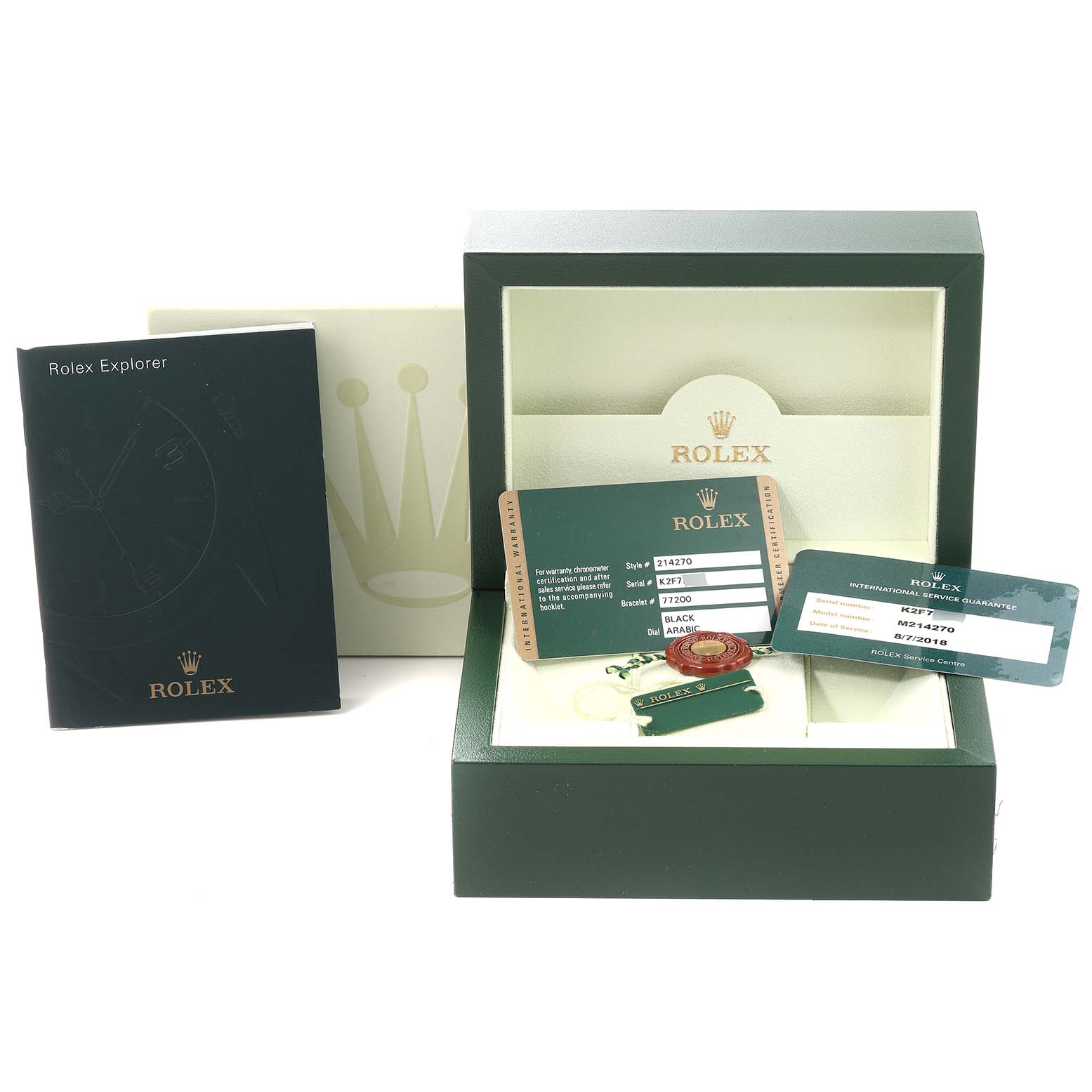 The image shows the packaging, cards, and tags for a Rolex Explorer 214270 Men's Stainless Steel Black Dial 214270 Men's Stainless Steel Black Dial watch, but the watch itself isn't visible.