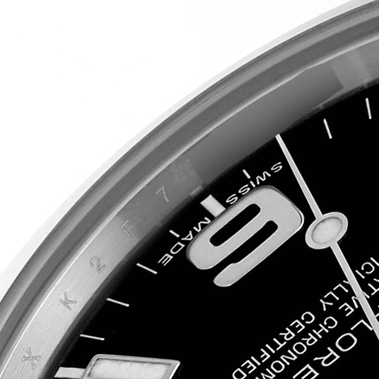 The image shows a close-up view of the dial and bezel of a Rolex Explorer 214270 Men's Stainless Steel Black Dial 214270 Men's Stainless Steel Black Dial watch.