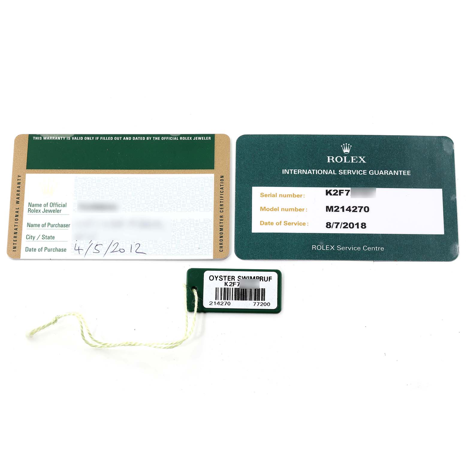The image shows warranty and service cards along with a tag for the Rolex Explorer 214270 Men's Stainless Steel Black Dial 214270 Men's Stainless Steel Black Dial model.