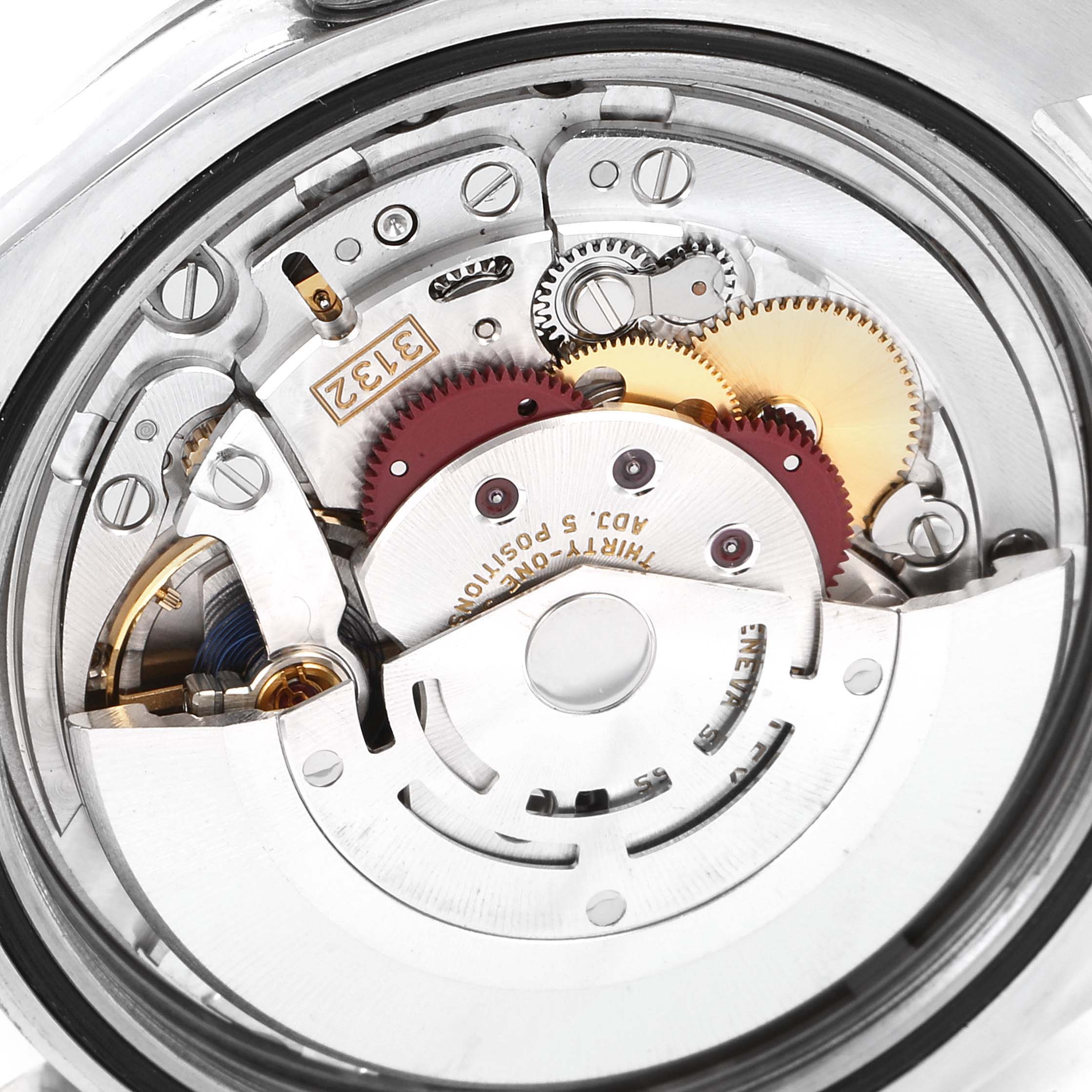 The image shows the intricate internal movement mechanism of a Rolex Explorer 214270 Men's Stainless Steel Black Dial 214270 Men's Stainless Steel Black Dial watch, viewed from the back.