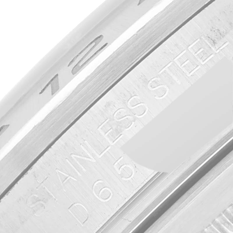 The image shows a close-up of the side engraving on a Rolex Explorer 16570 Men
s Stainless Steel White Dial 16570 Men
s Stainless Steel White Dial model, highlighting the "STAINLESS STEEL" text.