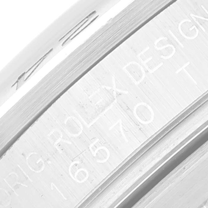 The image shows a close-up angle of the rim with the Rolex Explorer 16570 Men
s Stainless Steel White Dial 16570 Men
s Stainless Steel White Dial model 16570 engraved.