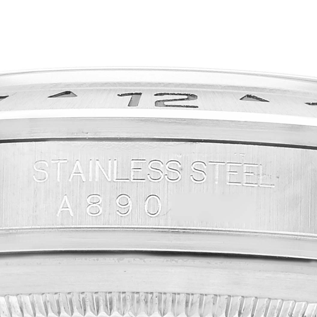 This close-up image of a Rolex Explorer 16570 Men
s Stainless Steel White Dial 16570 Men
s Stainless Steel White Dial watch shows the stainless steel case and model number engraving.