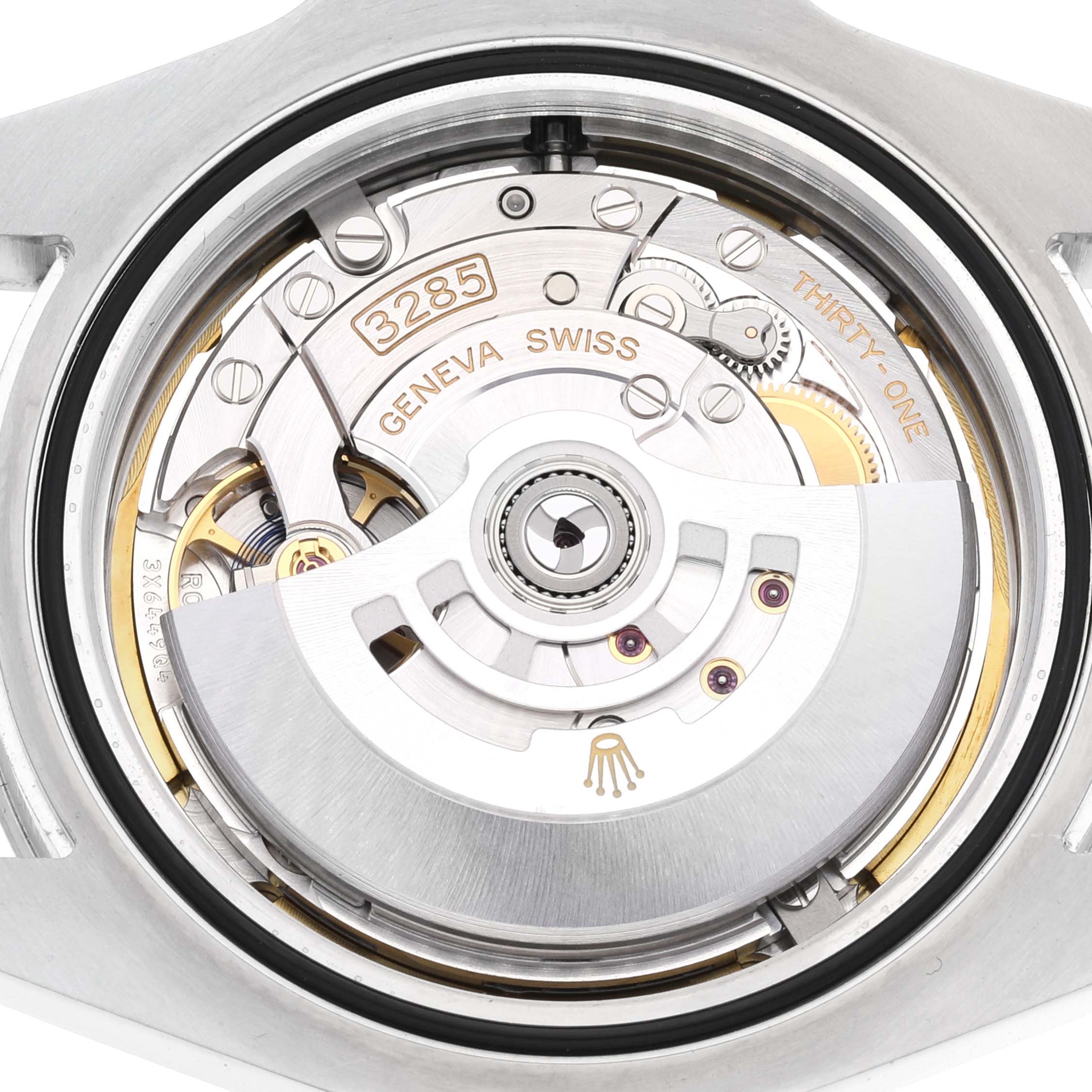 This is a close-up view of the movement mechanism of the Rolex Explorer 226570 Men
s Stainless Steel White Dial 226570 Men
s Stainless Steel White Dial watch, showing the internal components and inscriptions.