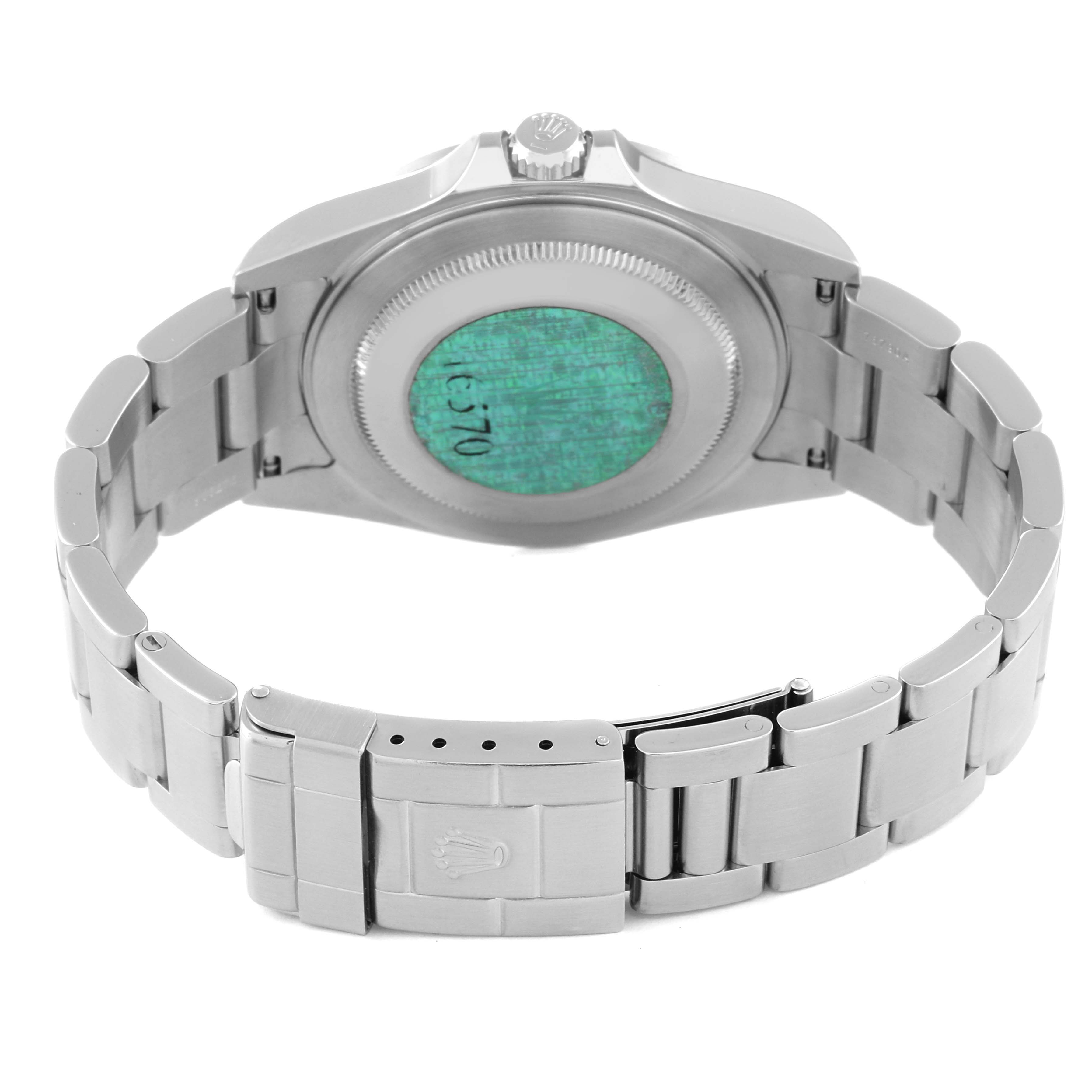 This image shows the backside of a Rolex Explorer 16570 Men's Stainless Steel Black Dial 16570 Men's Stainless Steel Black Dial model watch, featuring the bracelet, clasp, and case back.