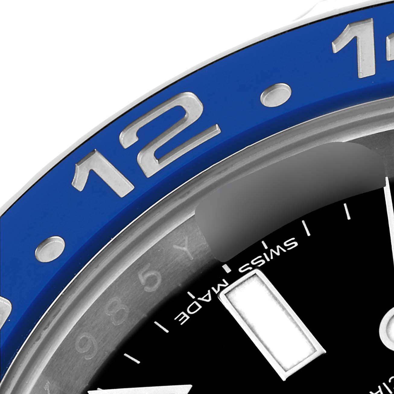 This close-up image shows the bezel and a portion of the dial of a Rolex GMT-Master 116710 Men
s Stainless Steel Black Dial 116710 Men
s Stainless Steel Black Dial watch.
