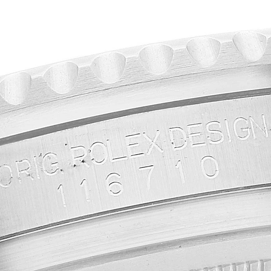 The image shows the side view of a Rolex GMT-Master 116710 Men
s Stainless Steel Black Dial 116710 Men
s Stainless Steel Black Dial model, featuring the model number and "ROLEX DESIGN" engraving.