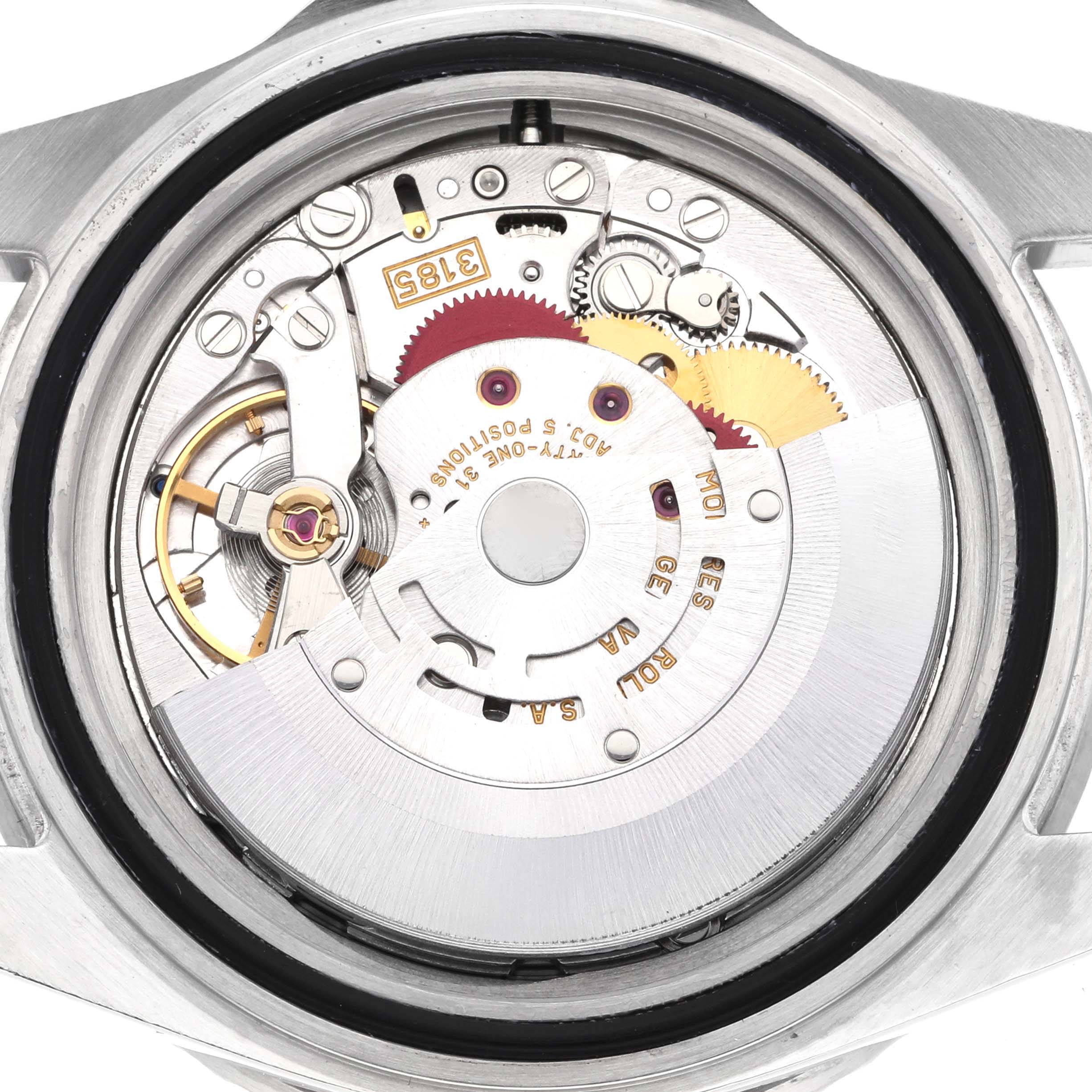 The image shows the open case back of a Rolex GMT-Master 16710 Men
s Stainless Steel Black Dial 16710 Men
s Stainless Steel Black Dial, revealing its inner movement and components.