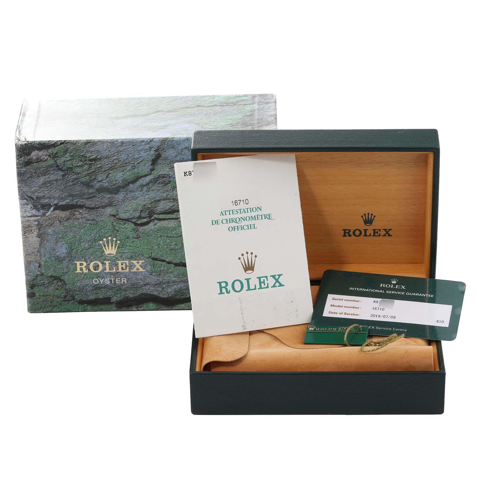 The image shows an open Rolex GMT-Master 16710 Men's Stainless Steel Black Dial 16710 Men's Stainless Steel Black Dial watch box with documentation and warranty cards displayed.