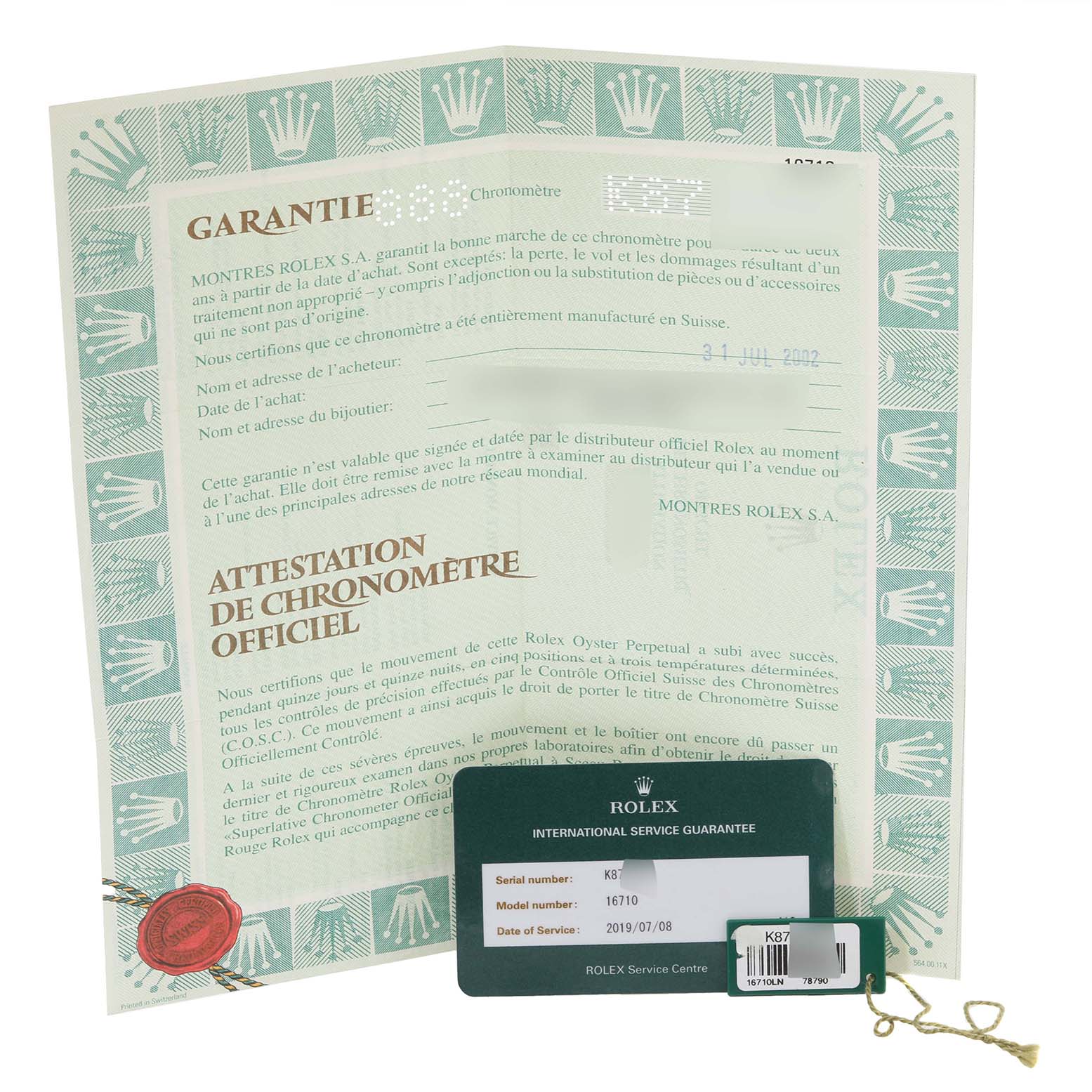 The image shows the warranty booklet and international service guarantee card for the Rolex GMT-Master 16710 Men's Stainless Steel Black Dial 16710 Men's Stainless Steel Black Dial model 16710.