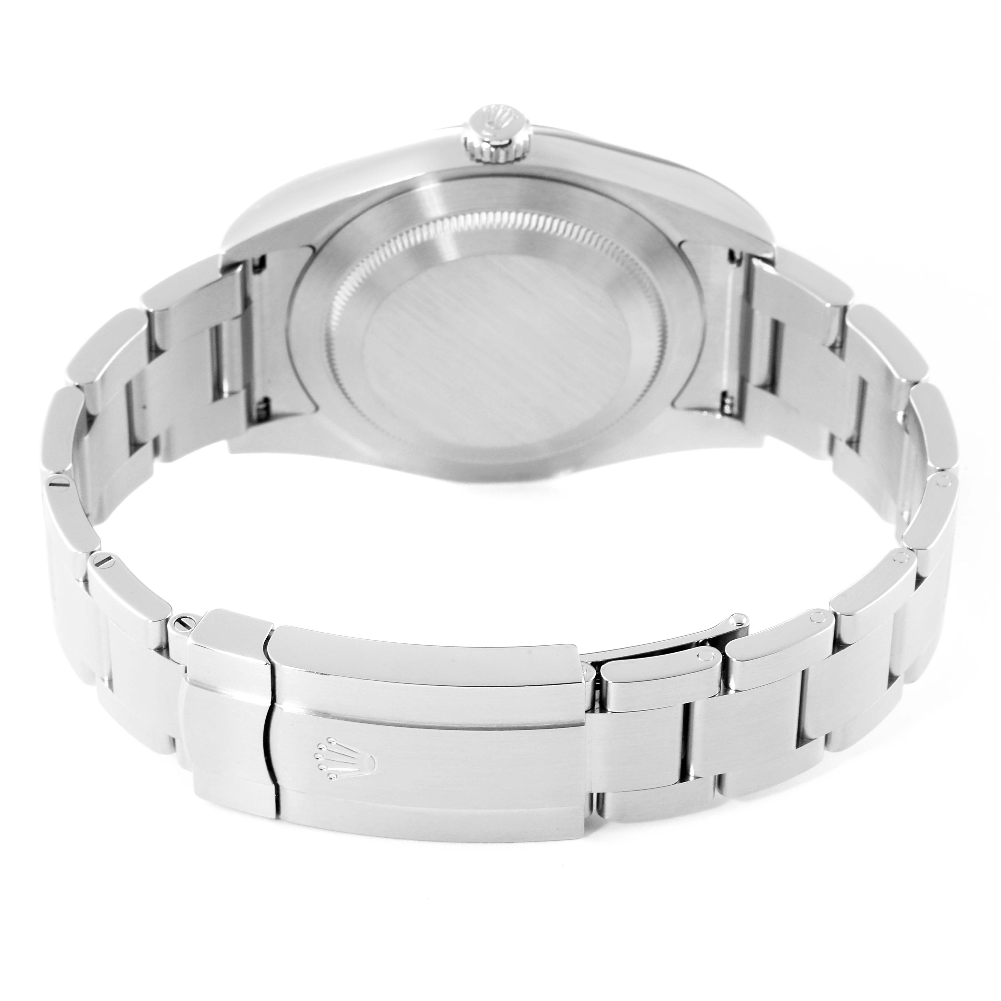 This image shows the back case and clasp of a Rolex Oyster Perpetual 114300 Men's Stainless Steel Blue Dial 114300 Men's Stainless Steel Blue Dial watch.