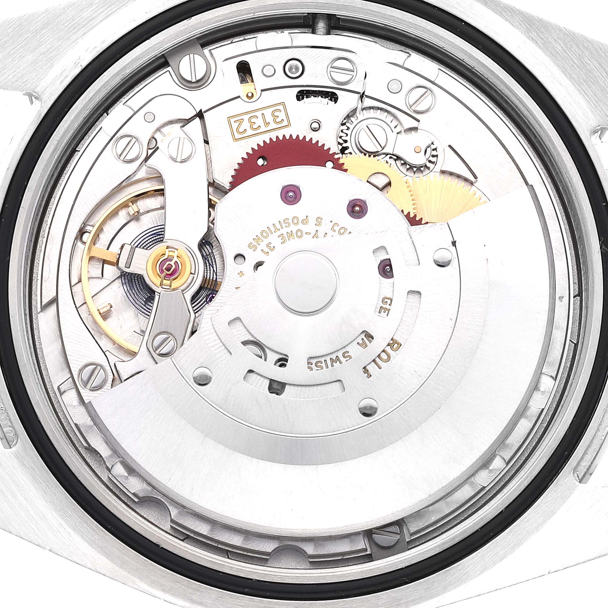 This image shows the intricate inner mechanism of a Rolex Oyster Perpetual 114300 Men's Stainless Steel Blue Dial 114300 Men's Stainless Steel Blue Dial watch from a close-up angle.