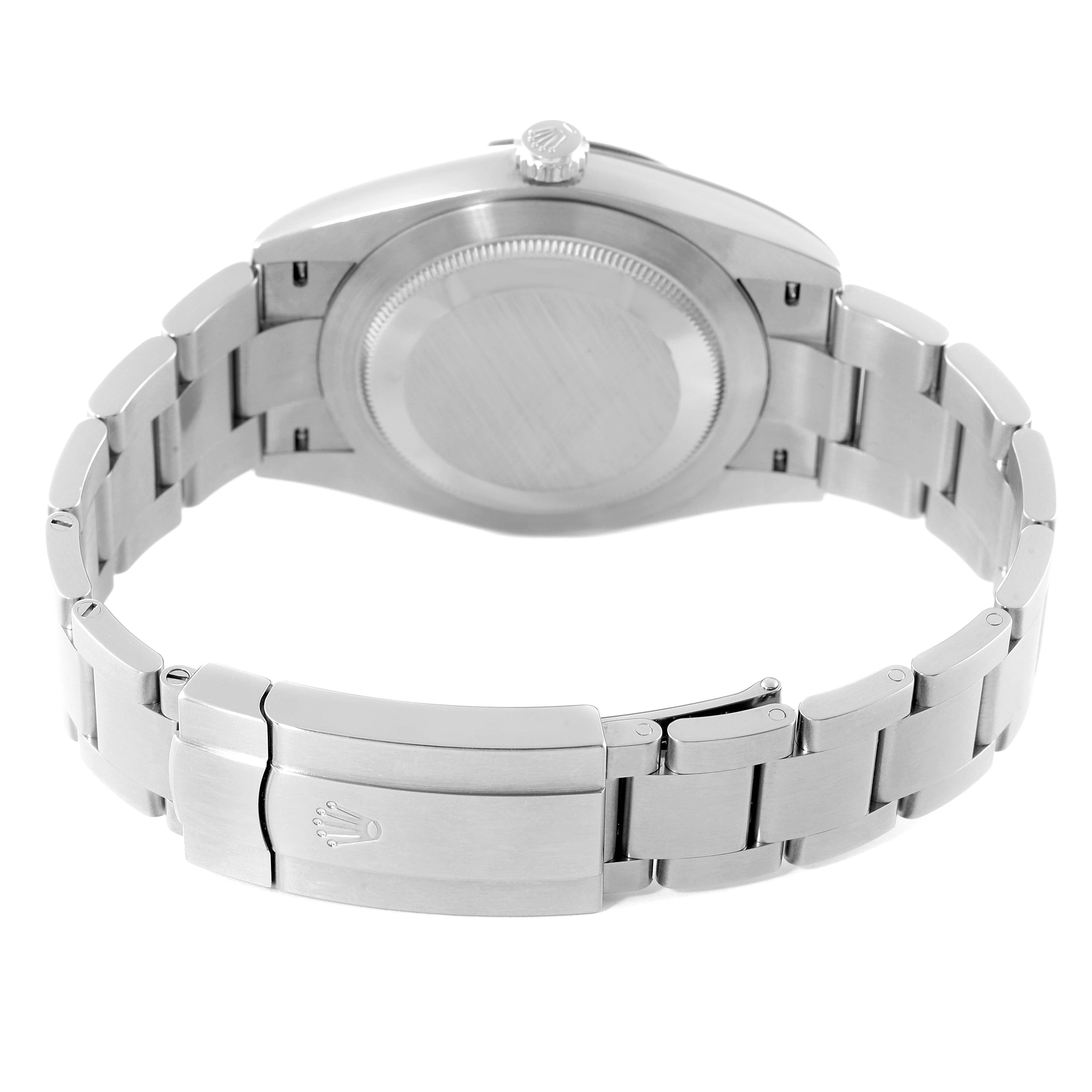 The image shows the back view of the Rolex Oyster Perpetual 124300 Men's Stainless Steel Silver Dial 124300 Men's Stainless Steel Silver Dial watch, including its case back and bracelet clasp.