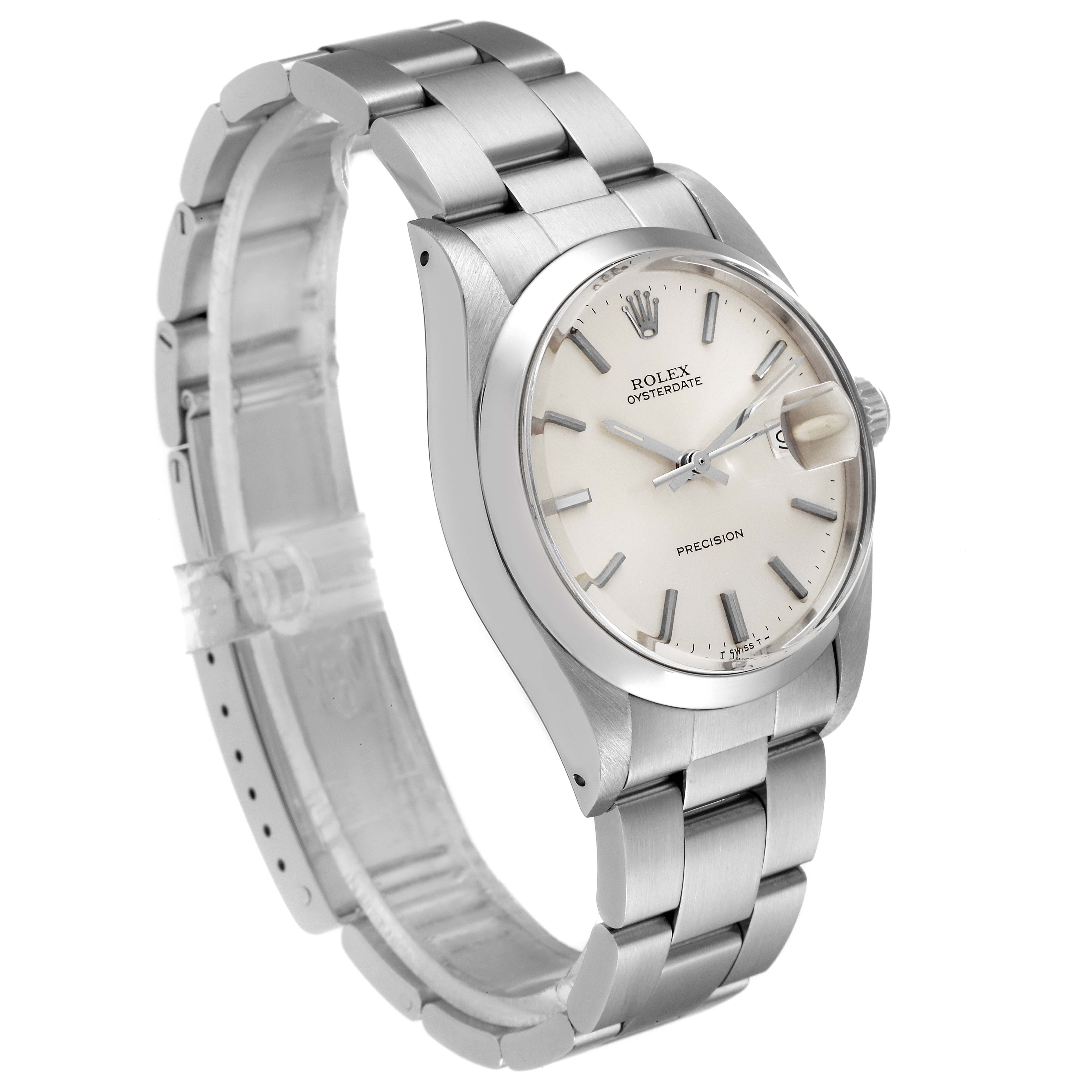The image shows a side angle view of the Rolex Vintage Collection 6694 Men
s Stainless Steel Silver Dial 6694 Men
s Stainless Steel Silver Dial watch, focusing on the dial, bracelet, and crown.