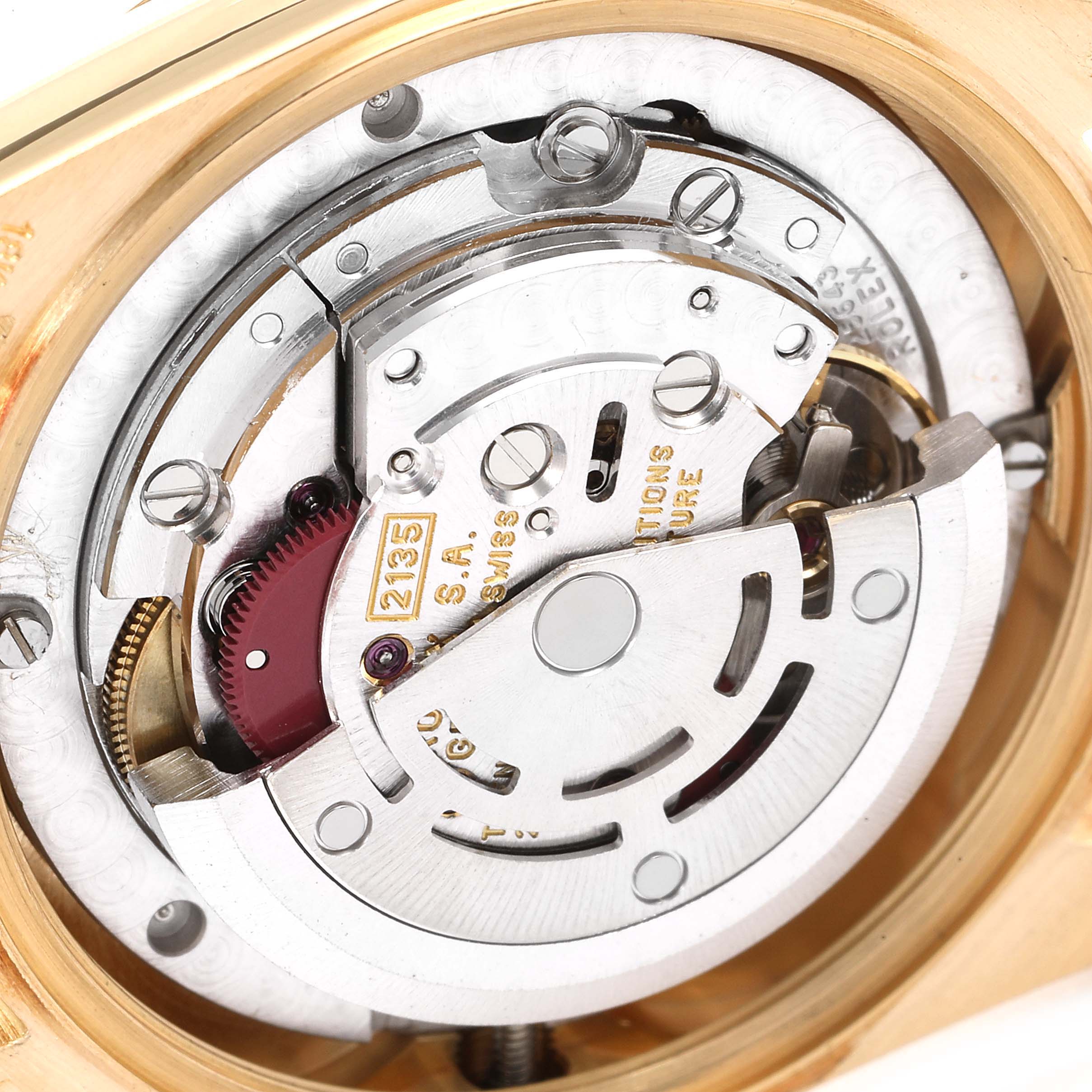 This image shows a close-up of the movement mechanism of a Rolex President 68278 Women's Yellow Gold Champagne Dial 68278 Women's Yellow Gold Champagne Dial model watch.