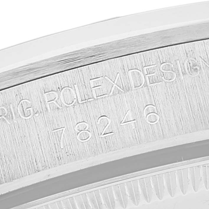 This is a close-up angle of the engraving on the case back edge of a Rolex President 78246 Women
s Platinum Silver Dial 78246 Women
s Platinum Silver Dial model watch.