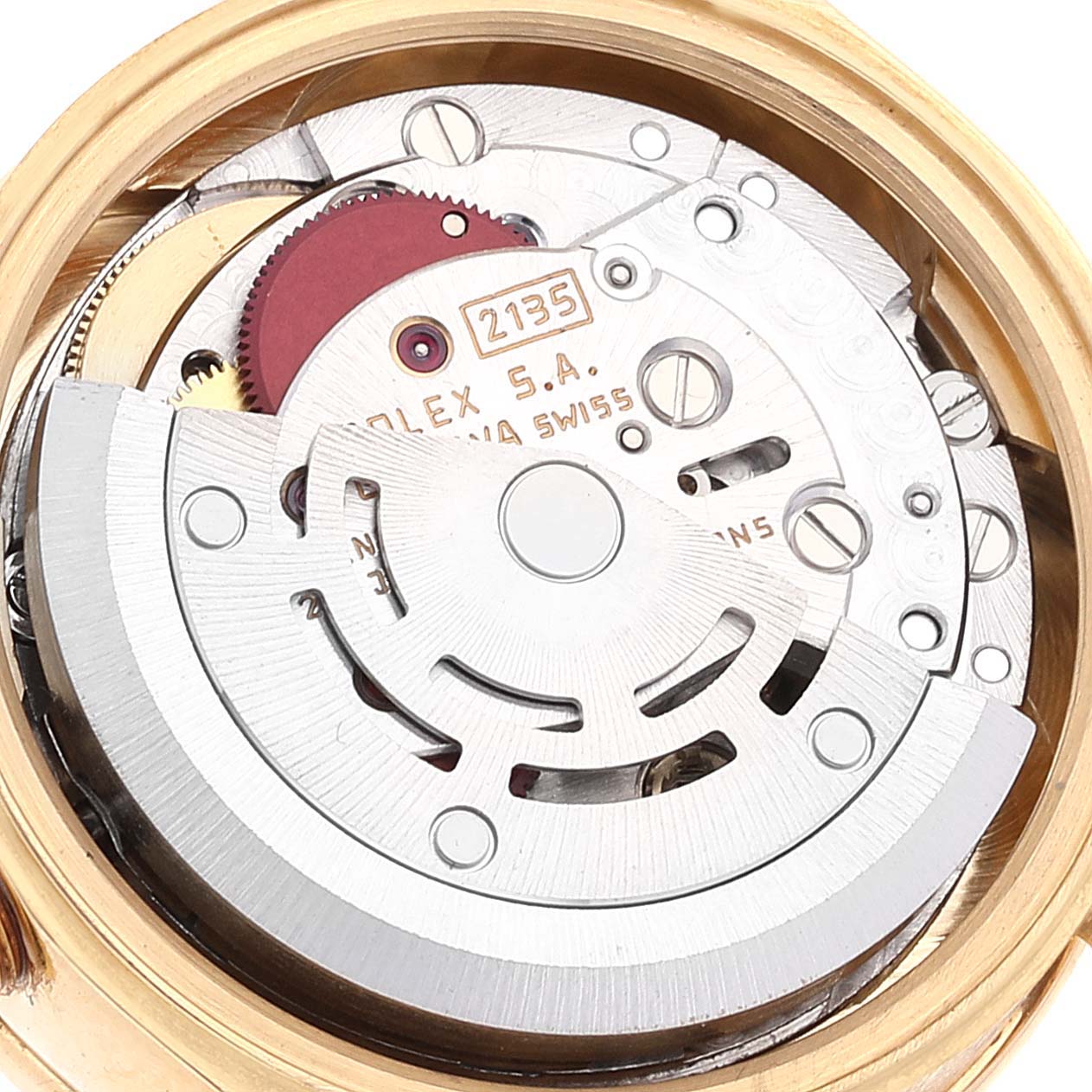 This image shows the internal components of a Rolex President 69138 Women
s Yellow Gold Champagne Dial 69138 Women
s Yellow Gold Champagne Dial model watch, focusing on the movement mechanism.