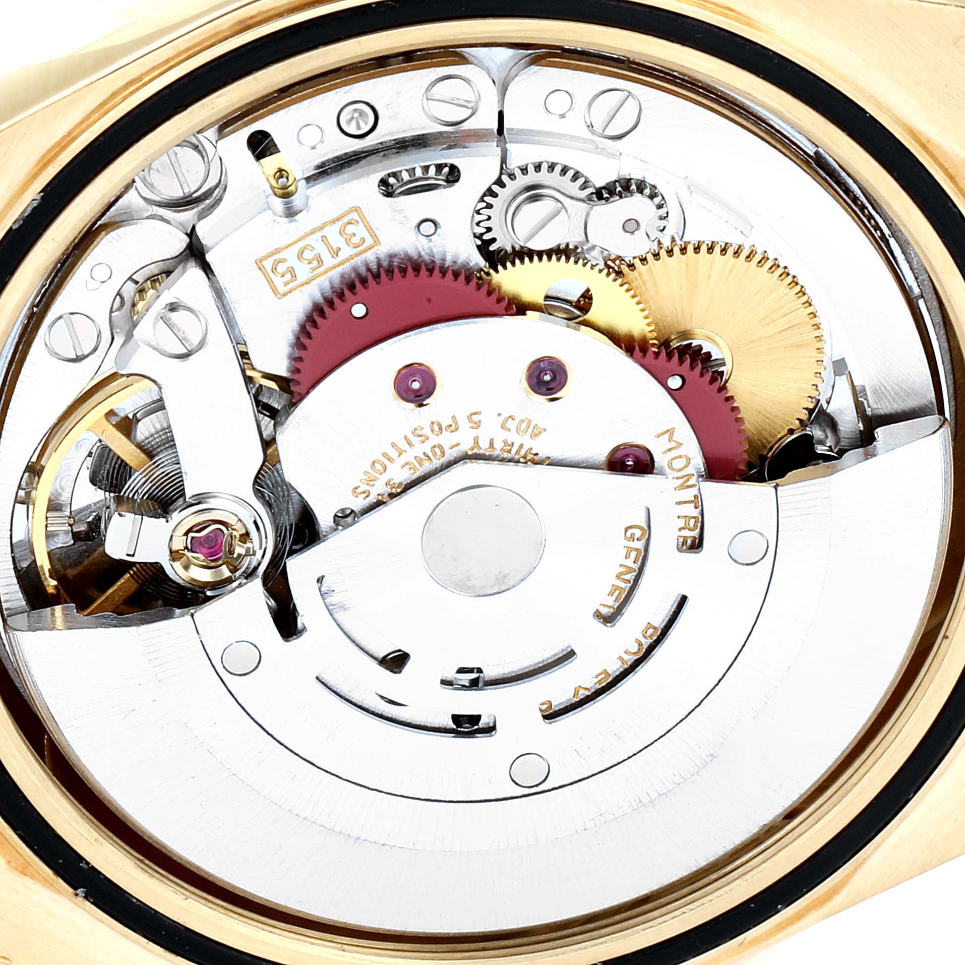 This image shows a close-up of the movement mechanism inside the Rolex President 18238 Men
s Yellow Gold Champagne Dial 18238 Men
s Yellow Gold Champagne Dial model watch, revealing its intricate gears and components.