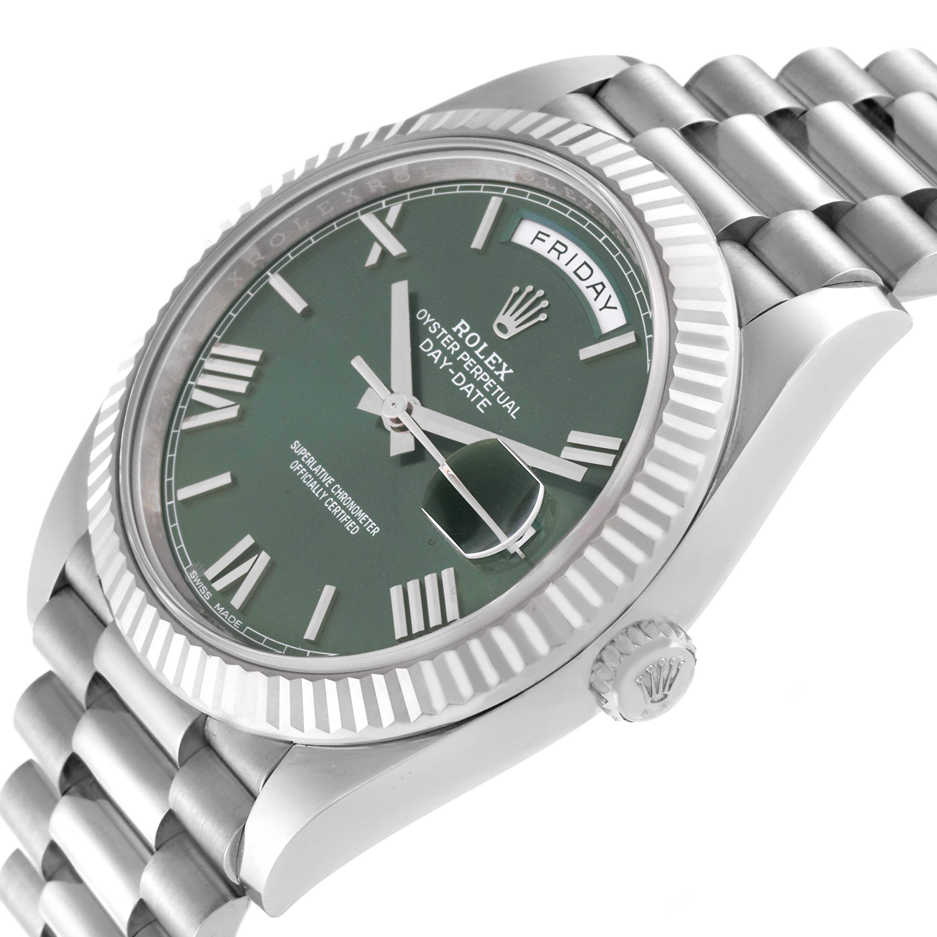 This image shows the Rolex President 228239 Men's White Gold Green Dial 228239 Men's White Gold Green Dial model watch at an oblique angle, highlighting the green dial, fluted bezel, and bracelet.