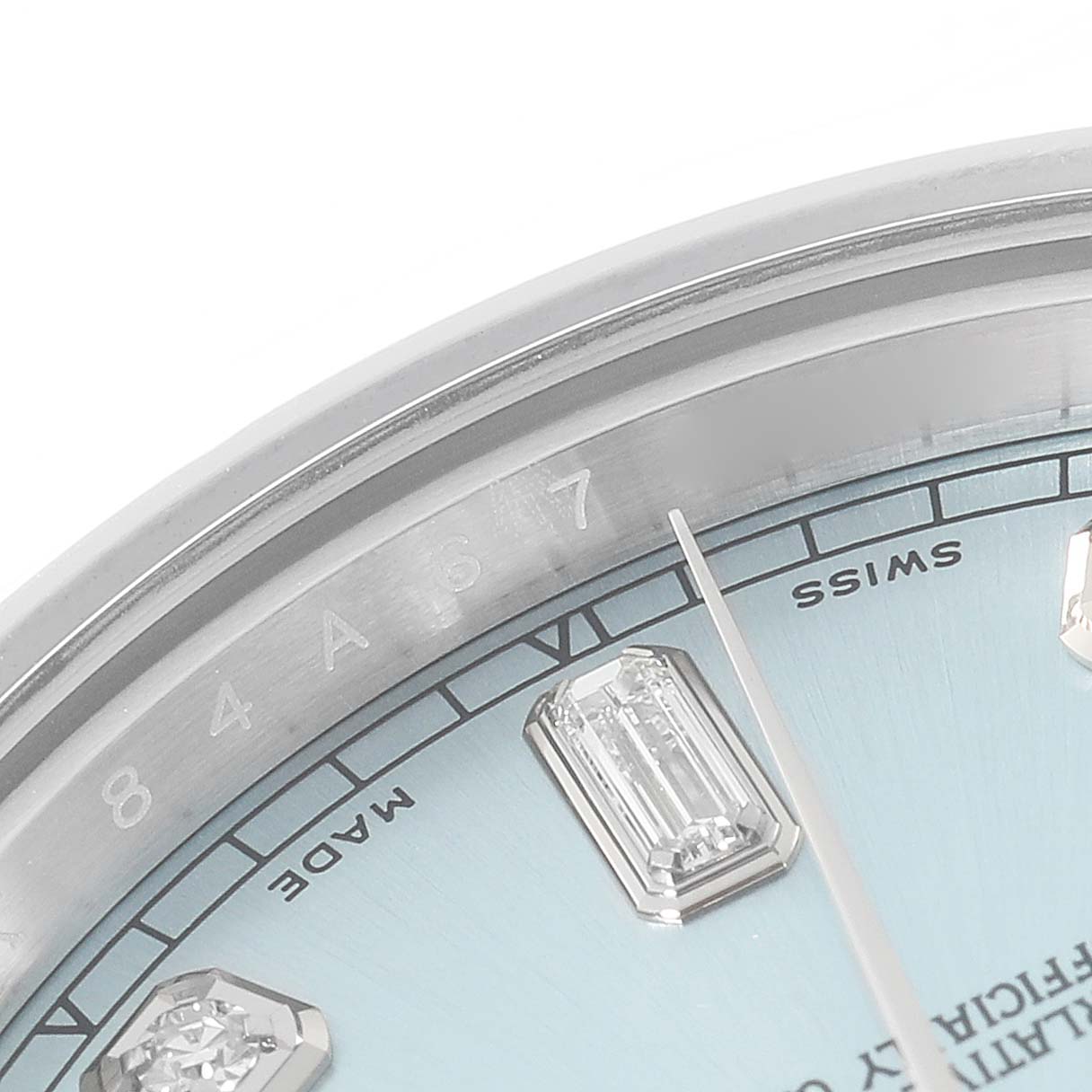 The image shows a close-up of the dial and bezel of a Rolex President 218206 Men's Platinum Blue Dial 218206 Men's Platinum Blue Dial model watch, highlighting the diamond markers.