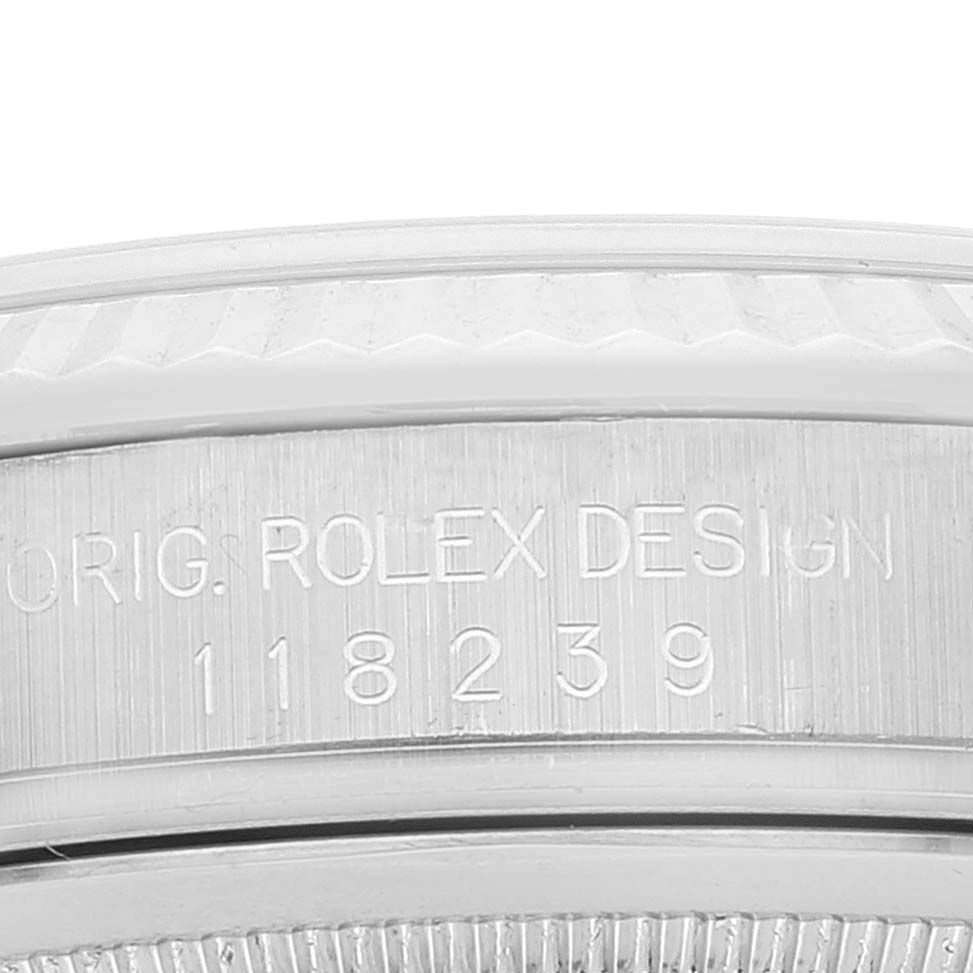 This image shows a close-up of the case side and serial number engraving of a Rolex President 118239 Men's Stainless Steel Silver Dial 118239 Men's Stainless Steel Silver Dial model watch.