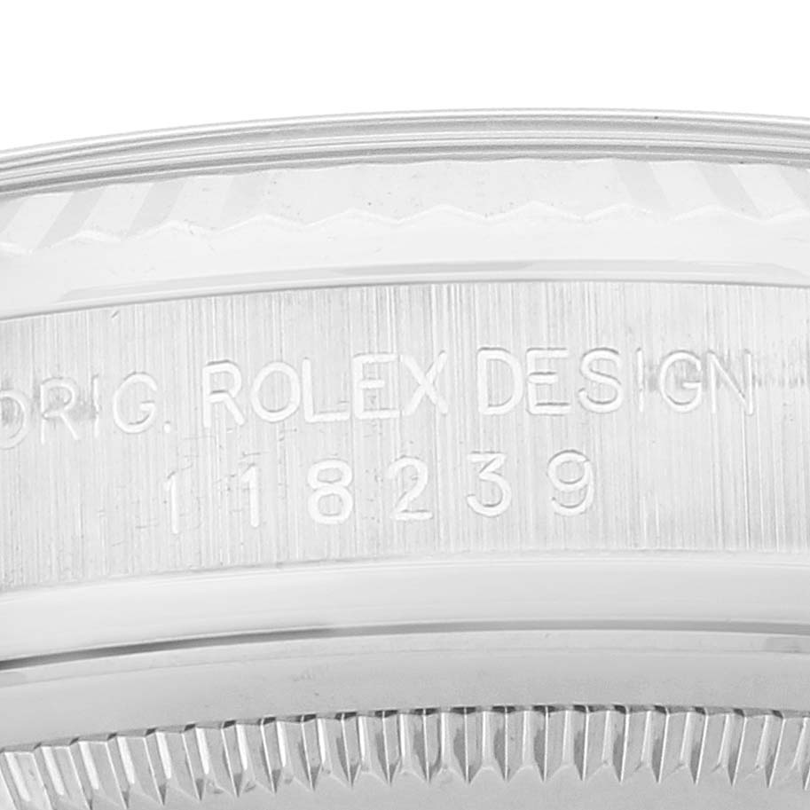 The image shows a close-up of the engraved reference number on the case side of a Rolex President 118239 Men's White Gold Silver Dial 118239 Men's White Gold Silver Dial model watch.
