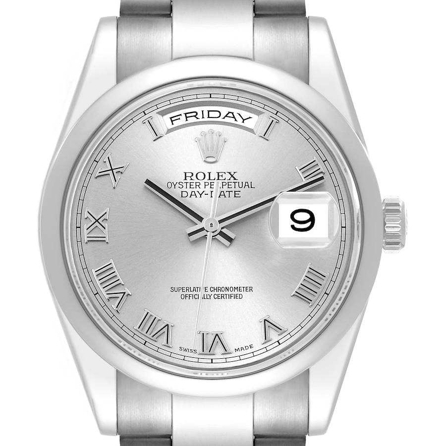 The Rolex President 118209 Men's White Gold Silver Dial model is shown from a front angle, displaying its silver dial, Roman numerals, day, and date features.