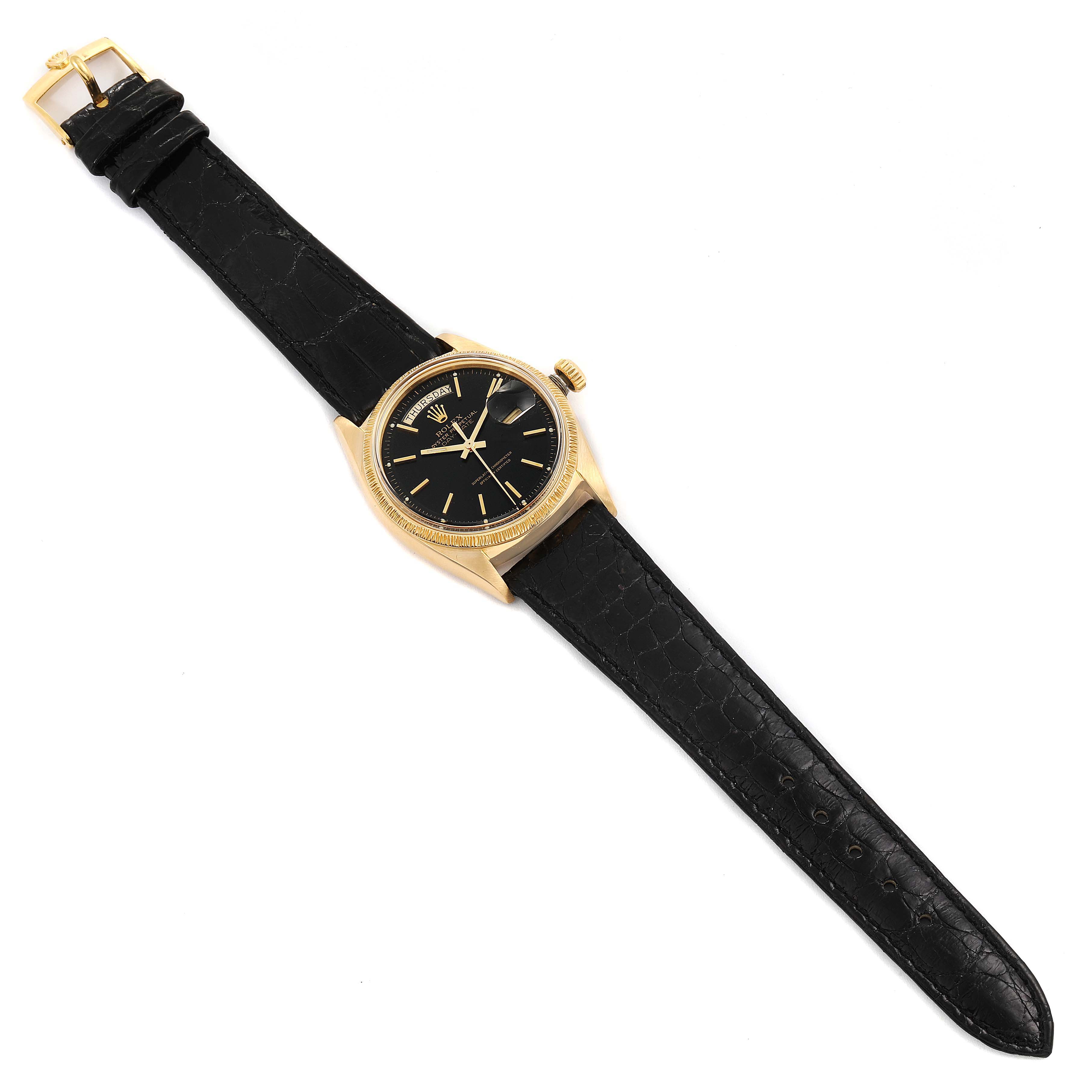 The Rolex President 1807 Men's Yellow Gold Black Dial 1807 Men's Yellow Gold Black Dial model watch is shown from a top view, displaying the black leather strap, gold case, and black dial.