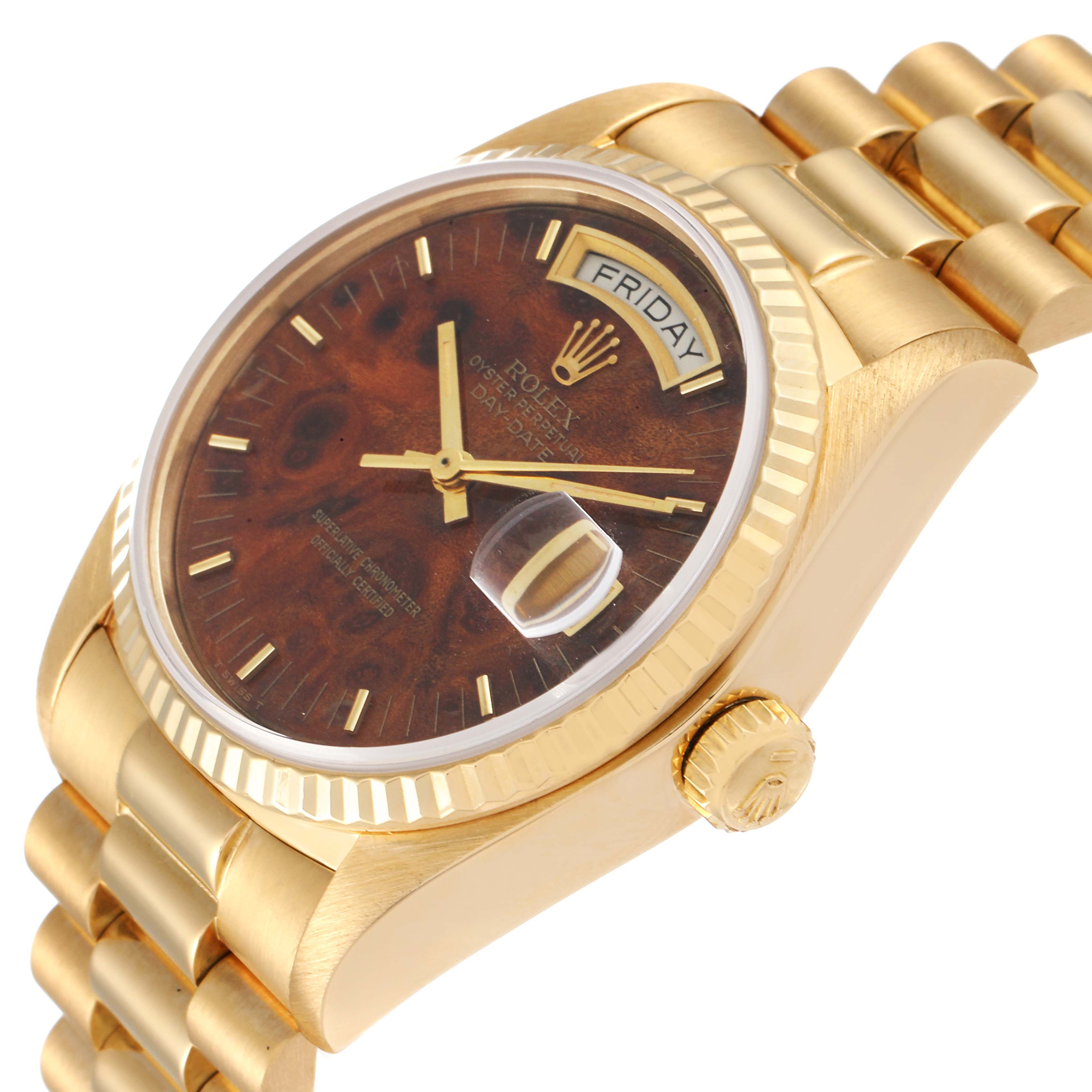 The image shows the dial, crown, bezel, and bracelet of a Rolex President 18038 Men's Yellow Gold Brown Dial 18038 Men's Yellow Gold Brown Dial model from an angled side view.