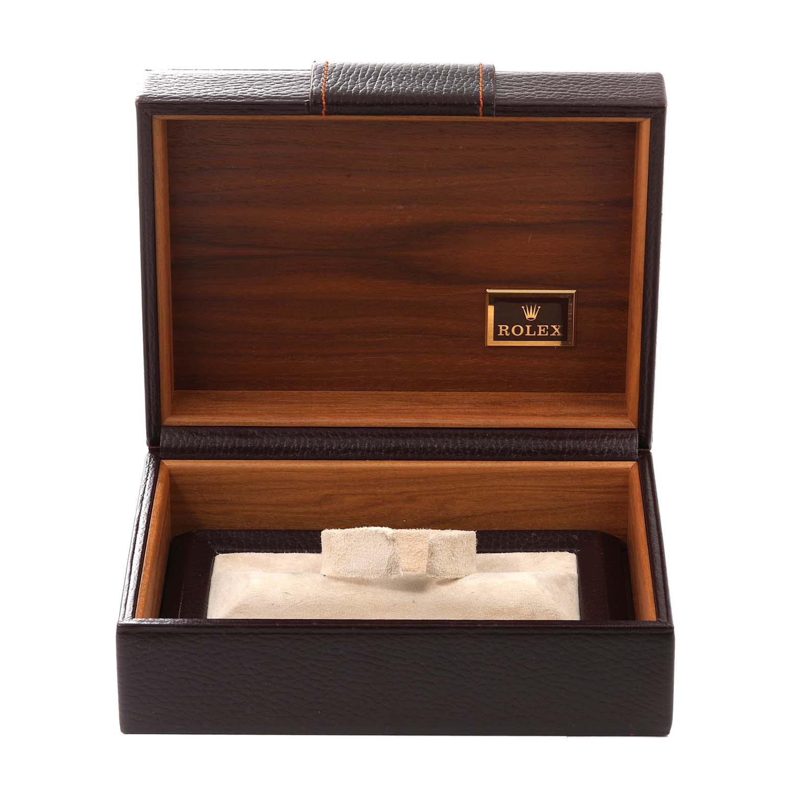 The image shows an open Rolex watch box for the President model, featuring wood and leather details.