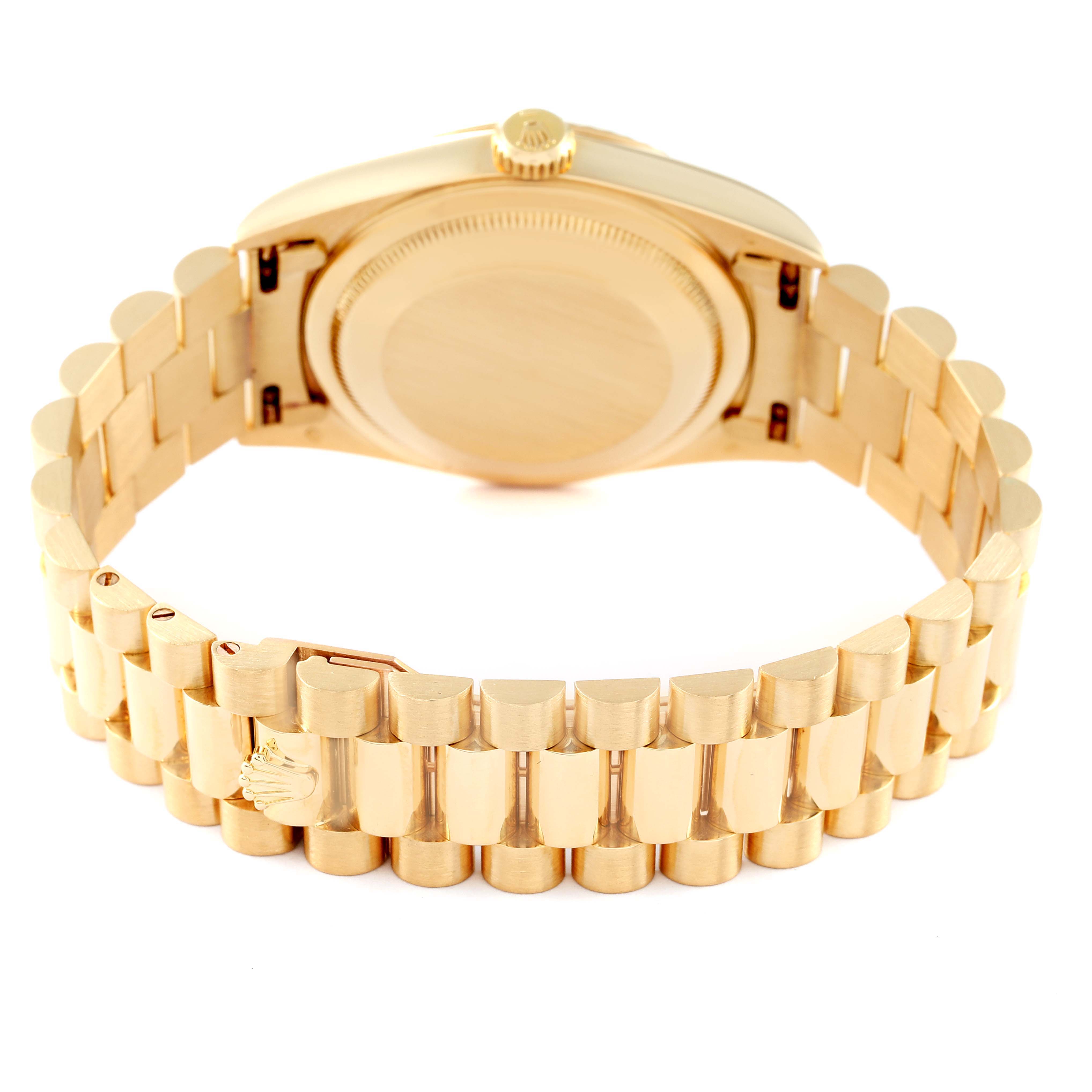 This image shows the back and bracelet of a Rolex President 18238 Men
s Yellow Gold Champagne Dial 18238 Men
s Yellow Gold Champagne Dial model watch, highlighting its clasp and case back.